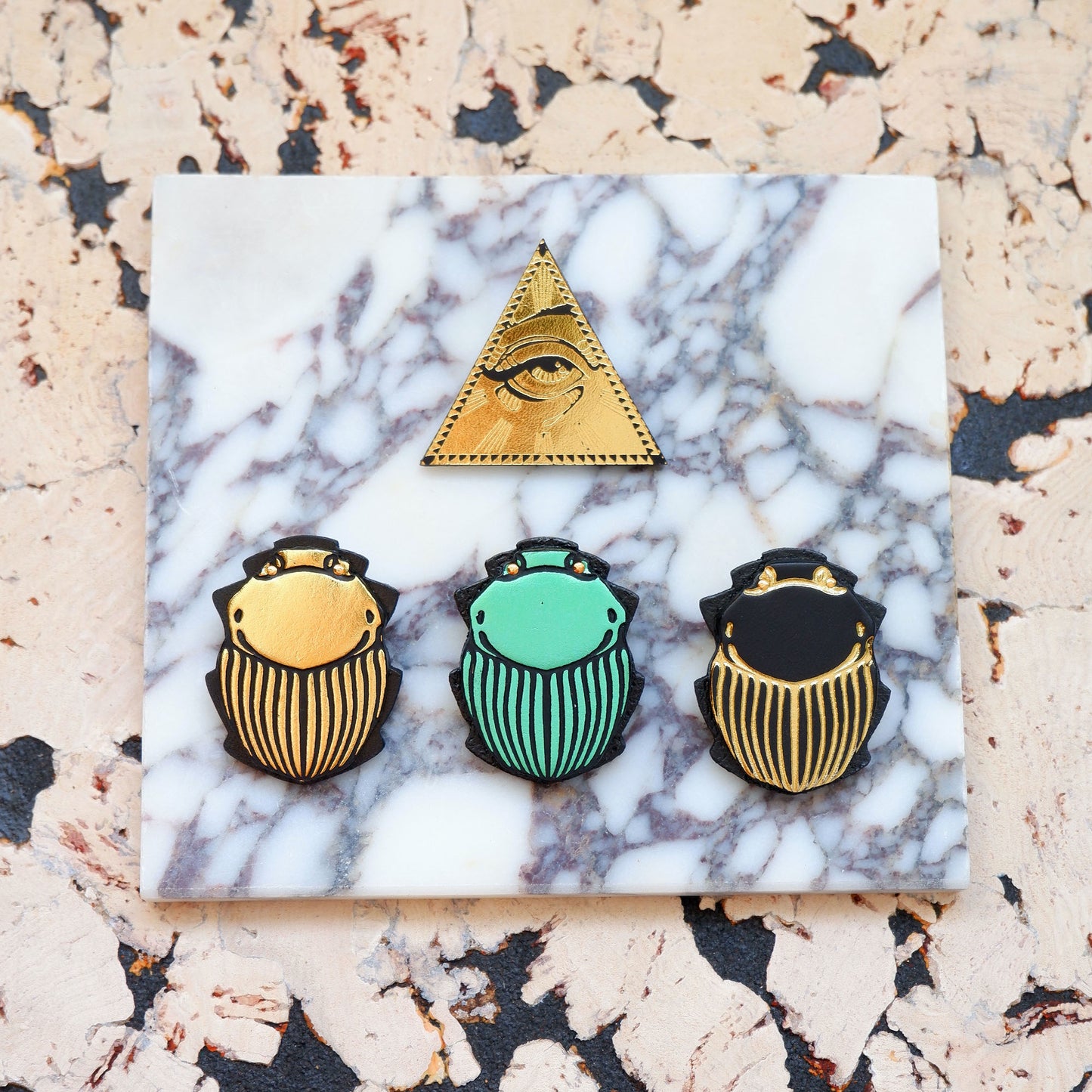 Leather bolo sliders, in gold, metallic jade green & black