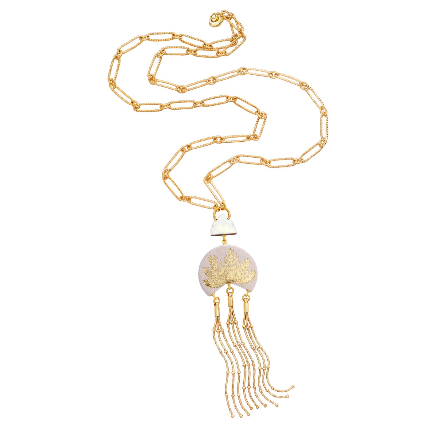 leather medallion pendant, with gold palm tree print, long gold chain tassels, and mother of pearl cloud, on long-link gold chain