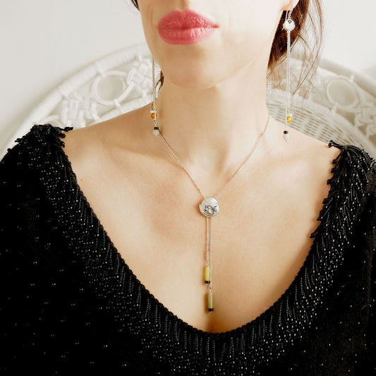 Volta mother of pearl full moon bolo lariat neklace & matching tassel earrings in sterling silver, on model