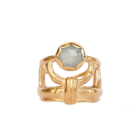 structural open-work ring in a bamboo style, featuring round blue/green cabochon aquamarine gemstone in a scalloped setting. Gold Vermeil.