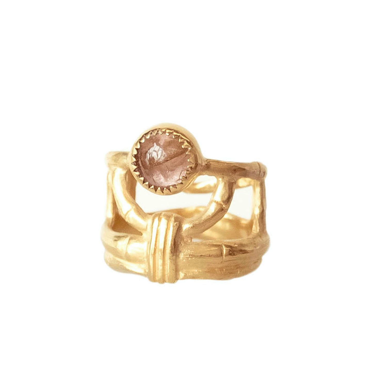 structural open-work ring in a bamboo style, featuring round pale peachy pink Tourmaline cabochon gemstone in a serrated setting. Gold Vermeil.