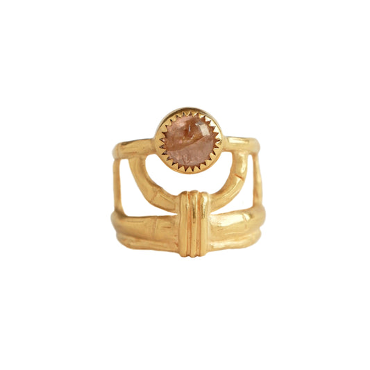 structural open-work ring in a bamboo style, featuring round pale peachy pink Tourmaline cabochon gemstone in a serrated setting. Gold Vermeil.