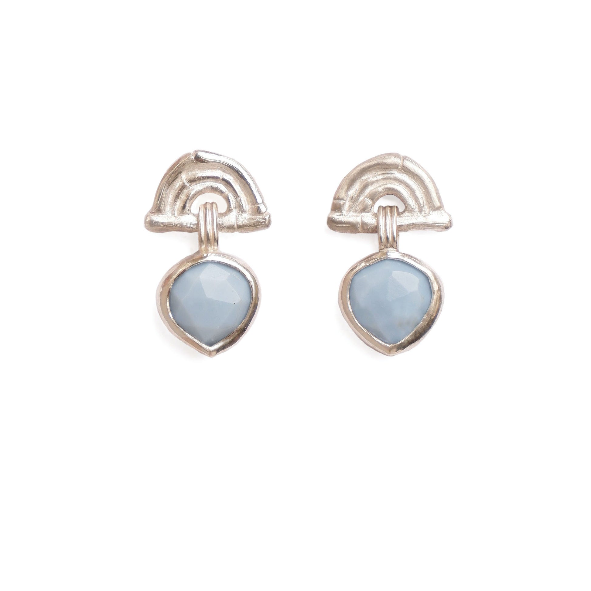 small stud earrings in sterling silver, featuring triple arches of bamboo, hung with a faceted blue opal gemstone pendant