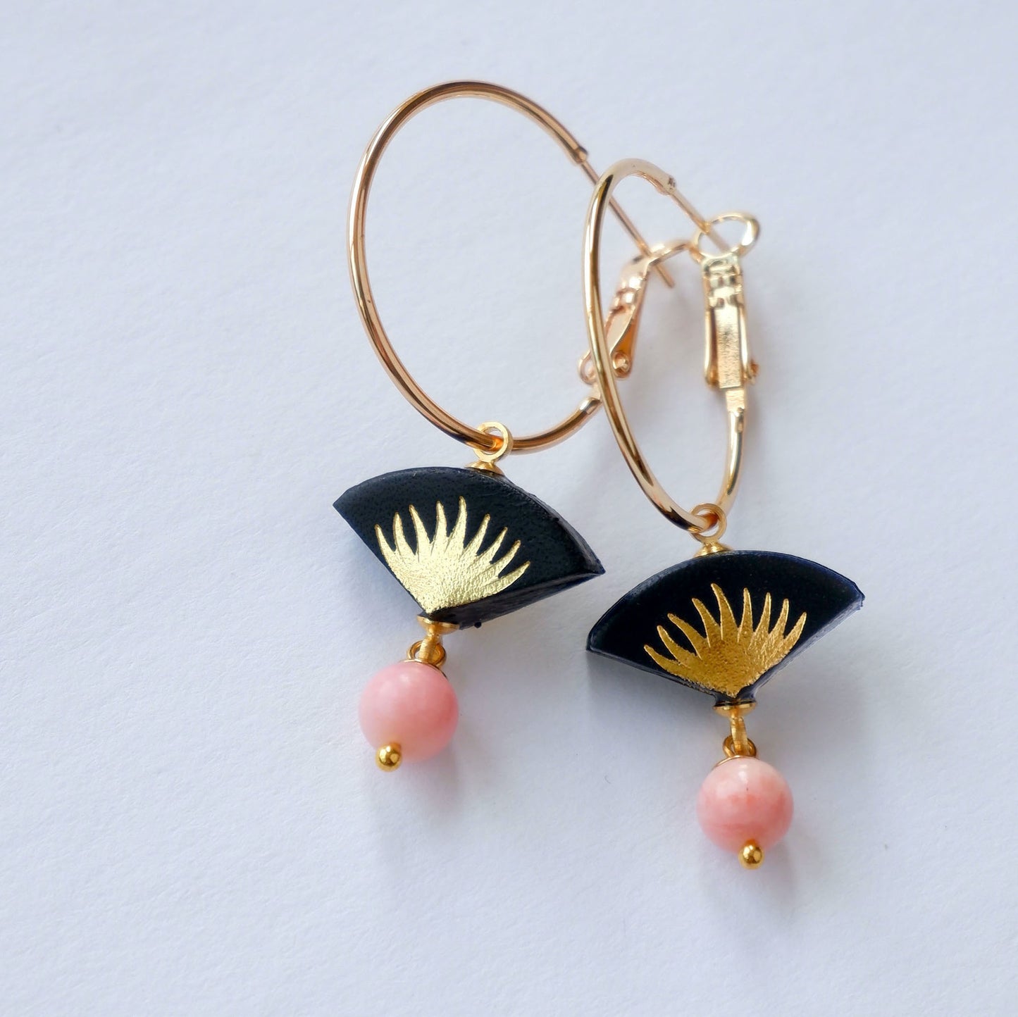 black & gold palm print leather gold hoop earrings with pink bead