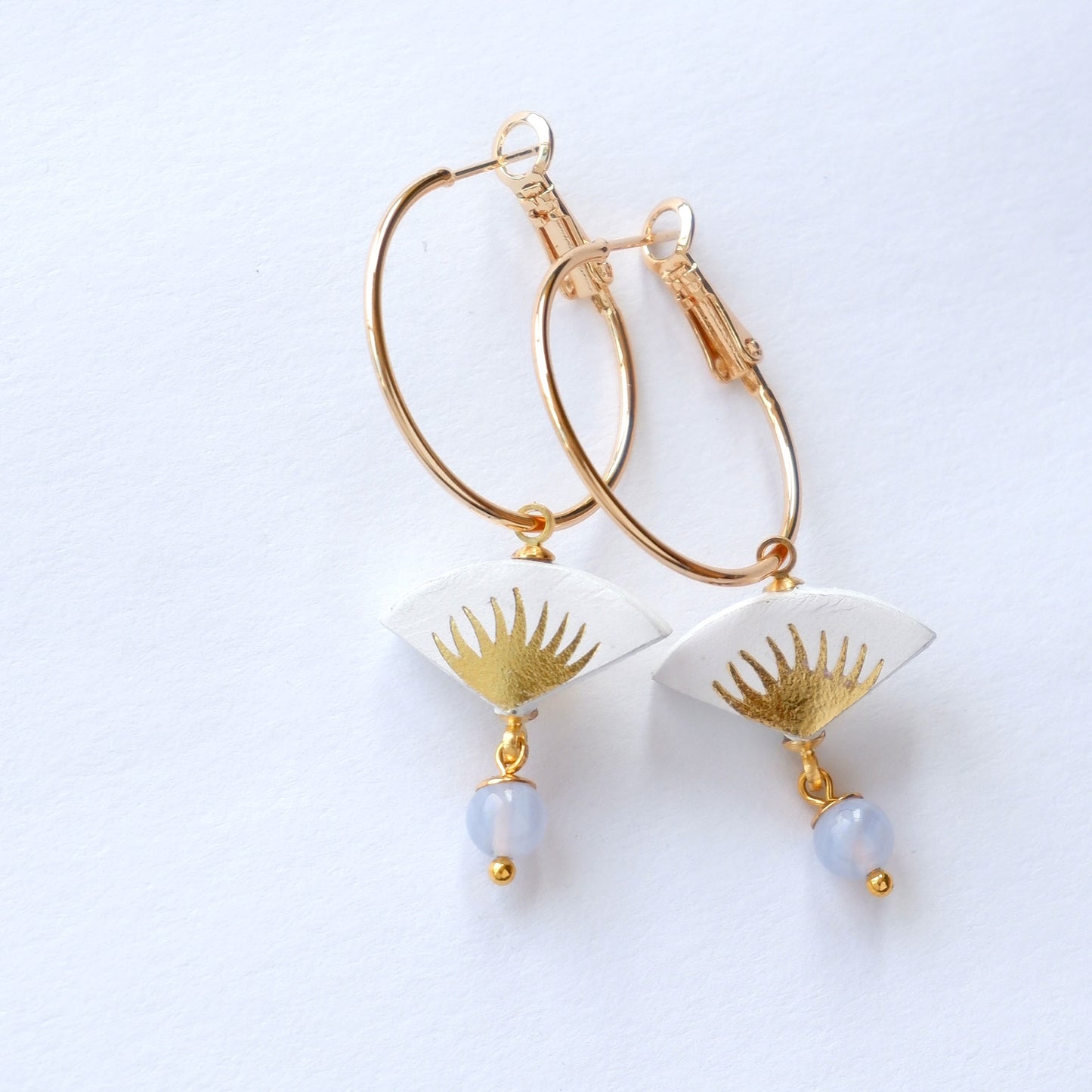 white & gold palm print leather gold hoop earrings with chalcedony bead