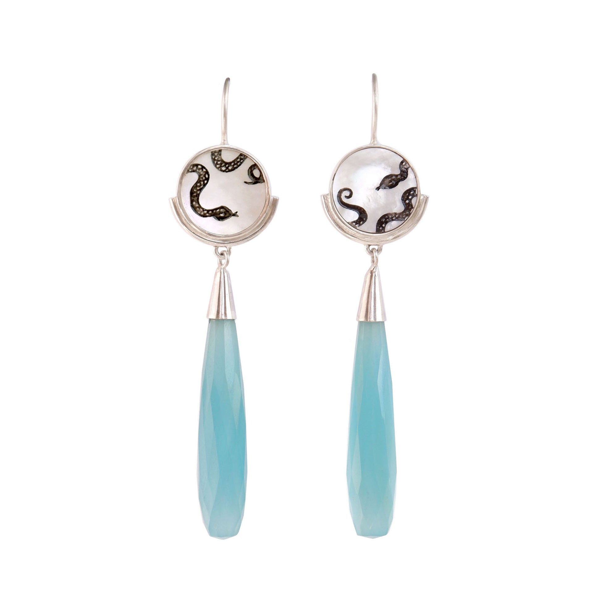 sterling silver earrings featuring mother of pearl discs, engraved with a blackened snake design, and adorned with long green faceted blue chalcedony gemstone drop pendants.