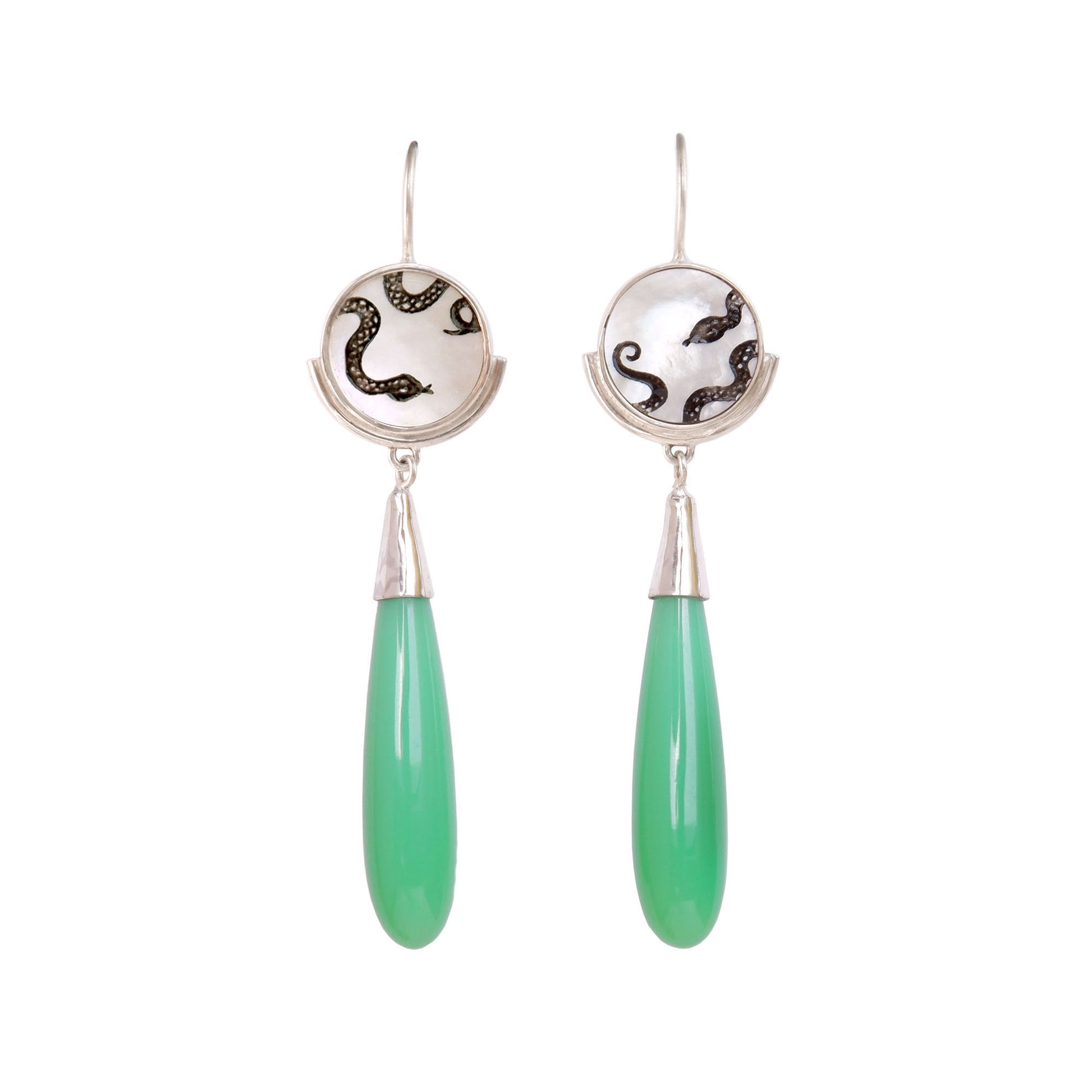 sterling silver earrings featuring mother of pearl discs, engraved with a blackened snake design, and adorned with long green smooth chrysoprase gemstone drop pendants.