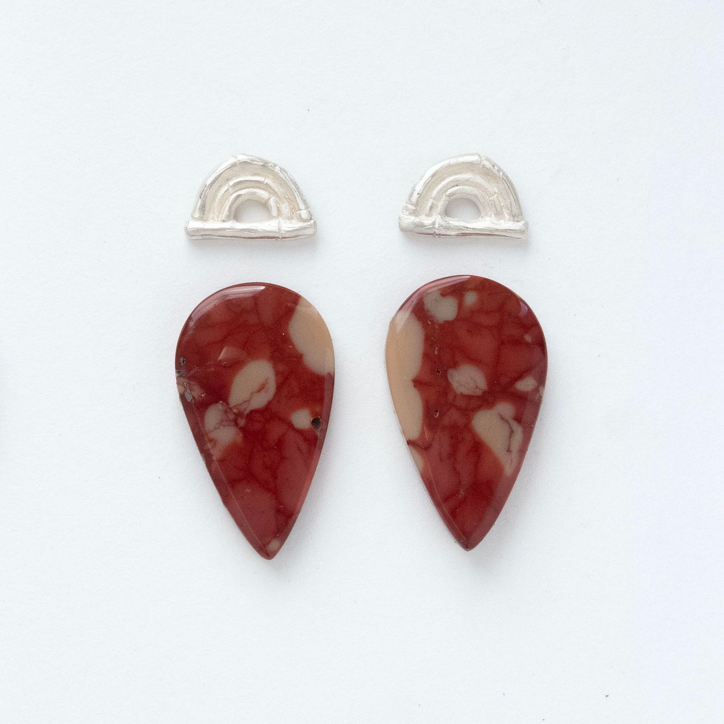 sterling silver triple bamboo arches earring tops, with long pointed pear/teardrop shaped gemstone cabochons in marbled blood red Mookaite Jasper
