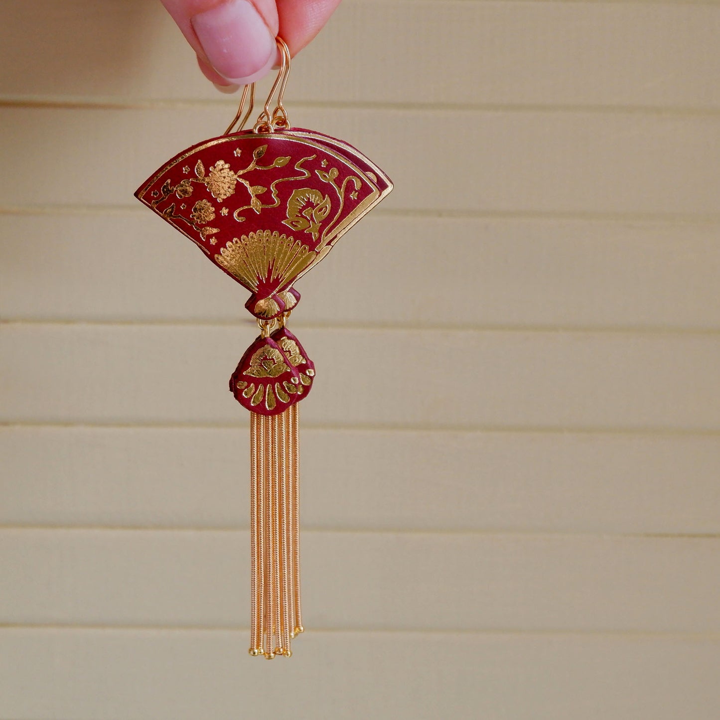 tasselled leather fan earrings in ox blood & gold