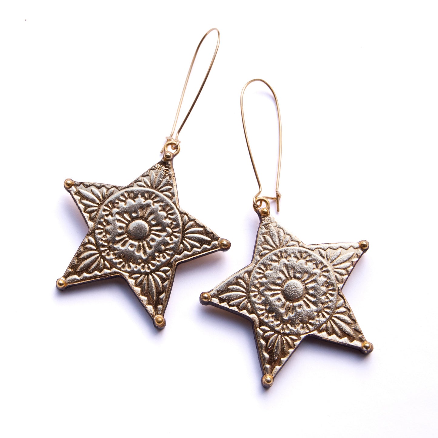 CONCHO STAR . earrings