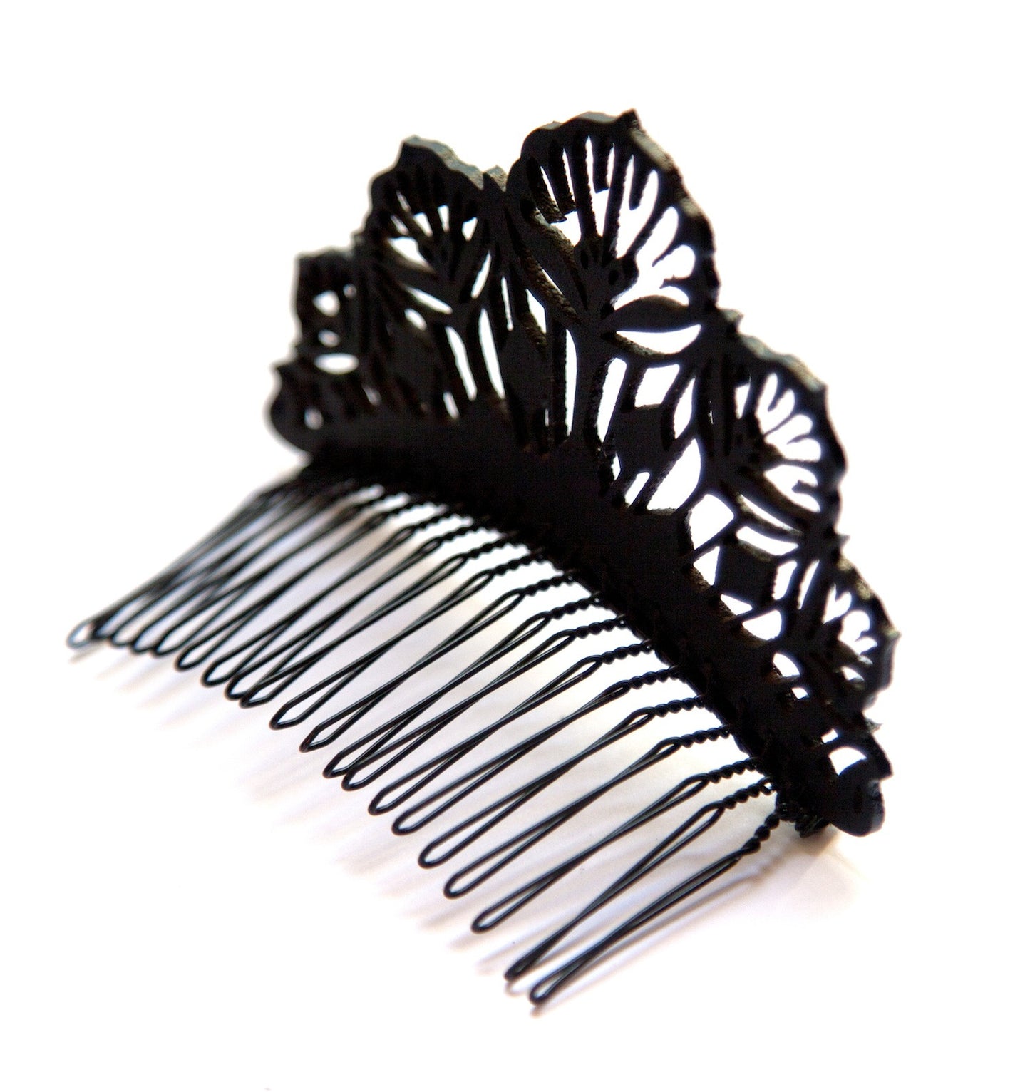 small black laser-cut lace style leather hair comb side view