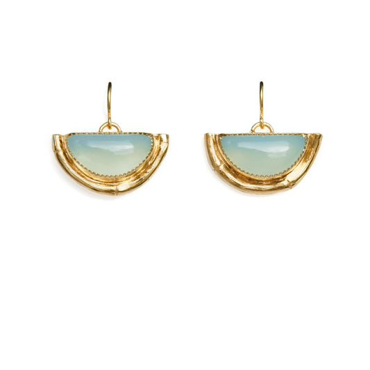 Earrings featuring half moon shaped semi precious aqua blue chalcedony gemstones,  cupped by solid silver bamboo hammock, plated in gold vermeil, with simple wire ear hooks.