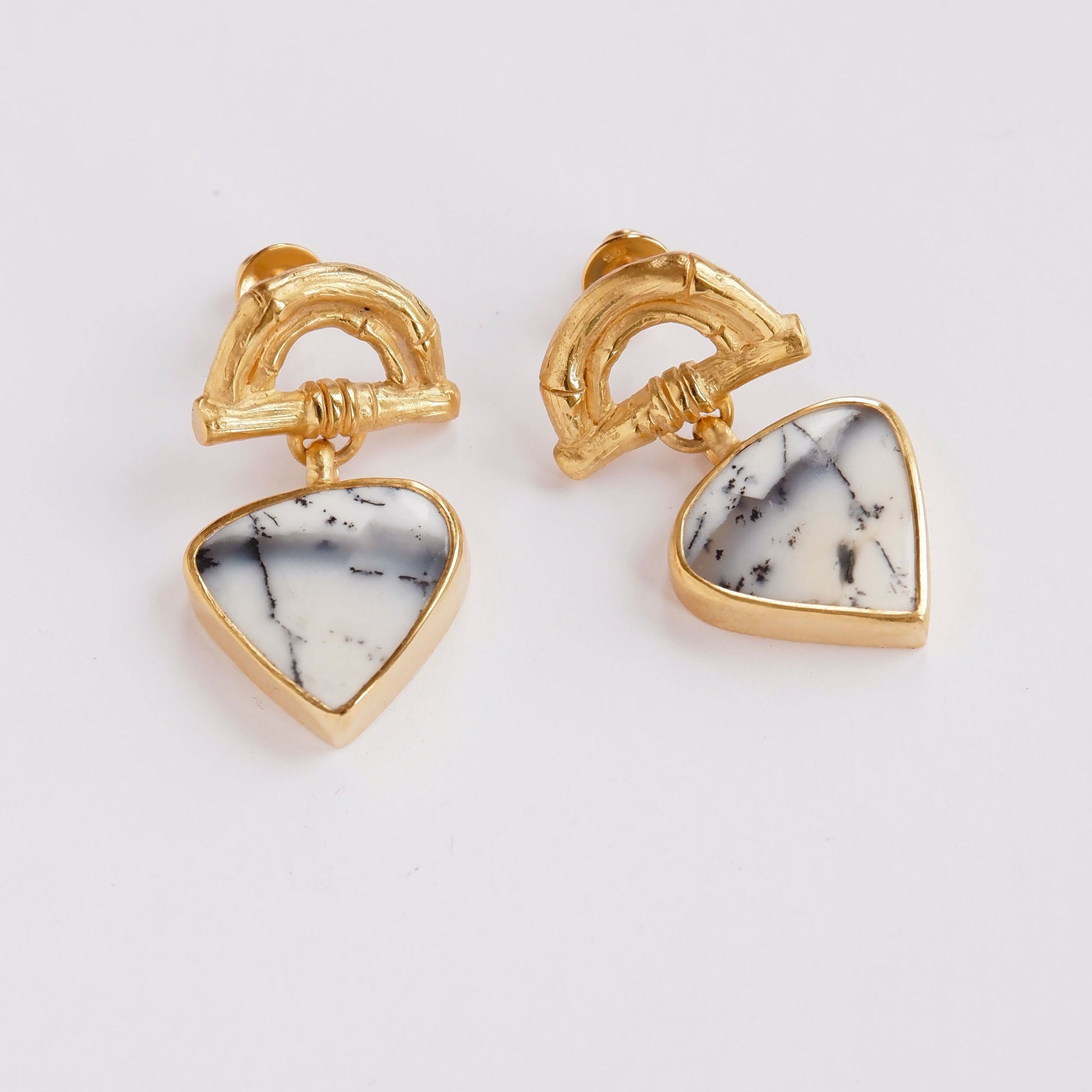 Gold Vermeil stud earrings featuring bamboo sunrise arch design, with gemstone drop pendants in white & grey Dendrite Opal