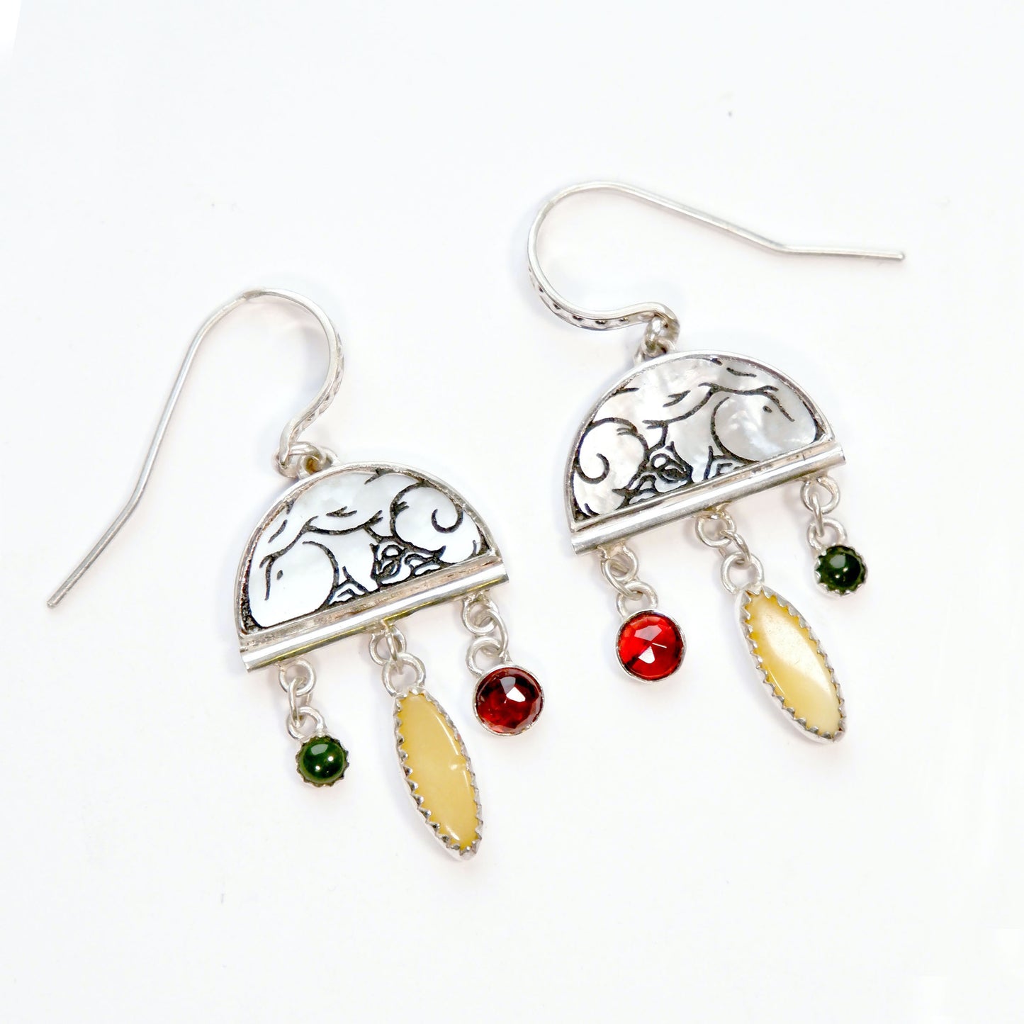 sterling silver half moon earrings, set with mother of pearl, engraved with squirrel illustration, and gemstone drops.