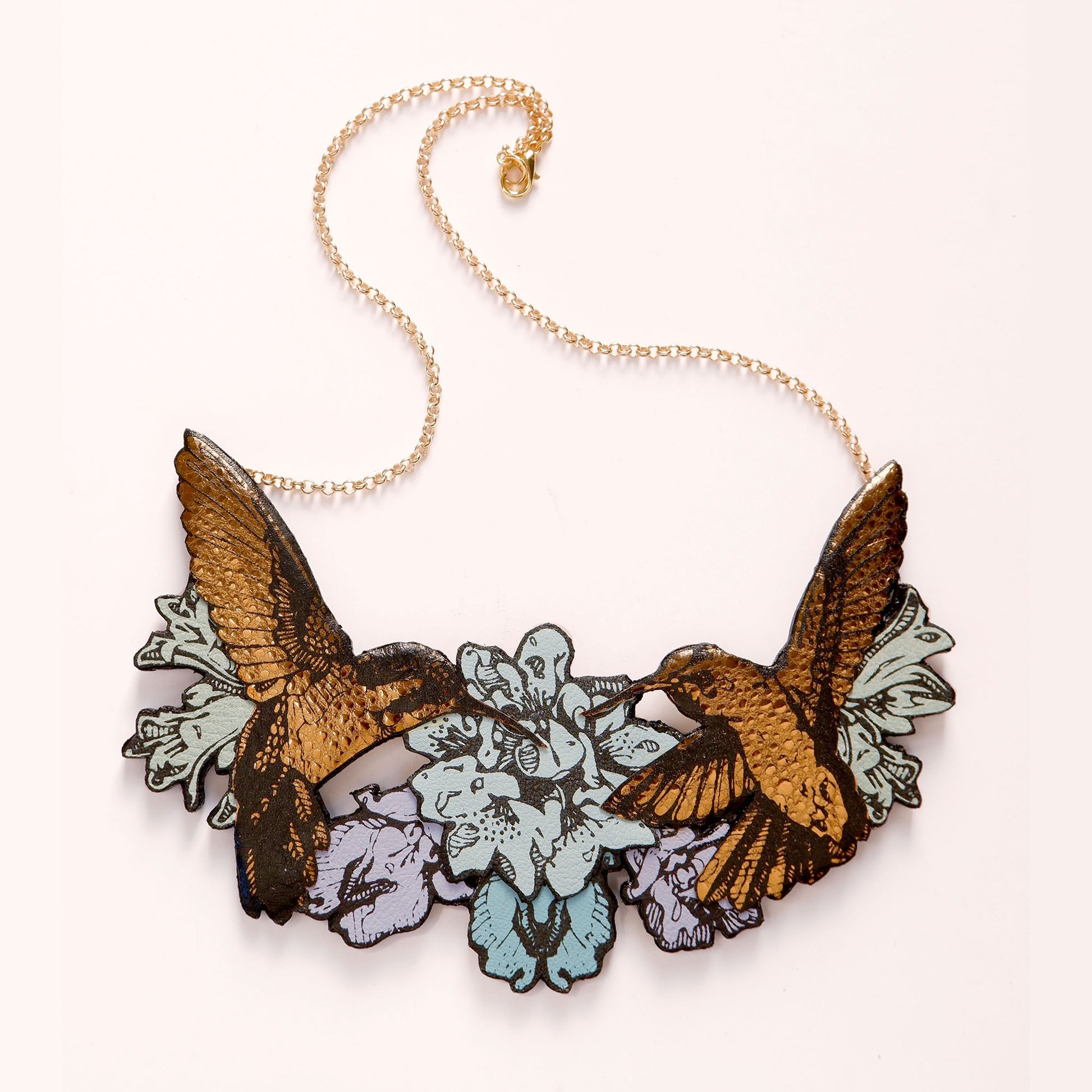 Hummingbird Necklace in collaged screen-printed coloured leather, on gold plated chain.