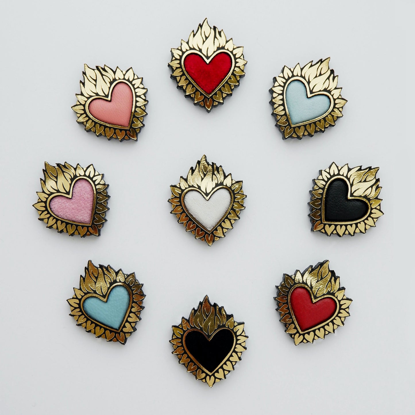 Flaming Heart jewels, in Gold Foiled Leather, with a coloured padded leather centres, in leather & velvet. ( 9 different colours)