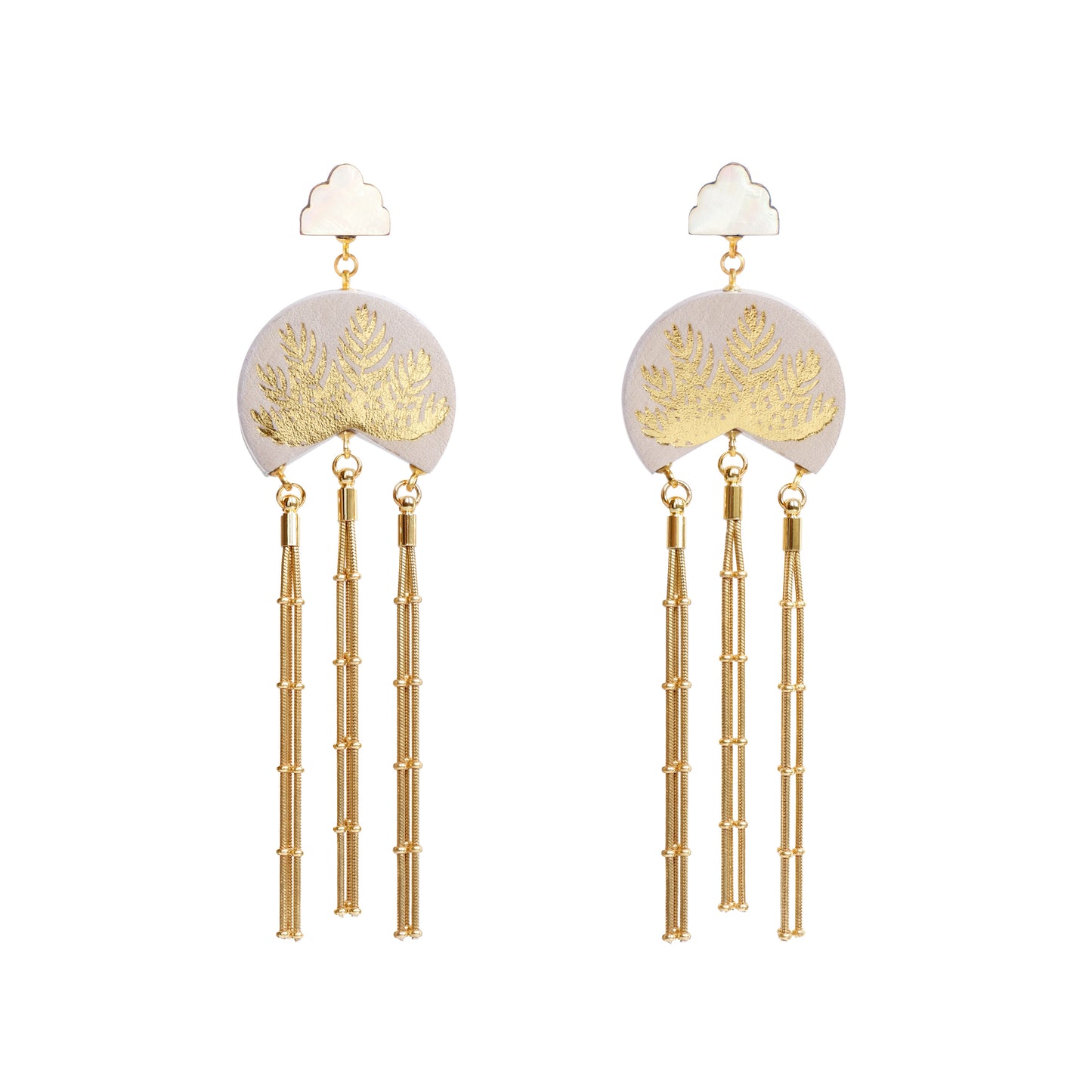 lilac leather medallion earrings, with gold palm tree print, gold tassels & mother of pearl cloud shade studs.