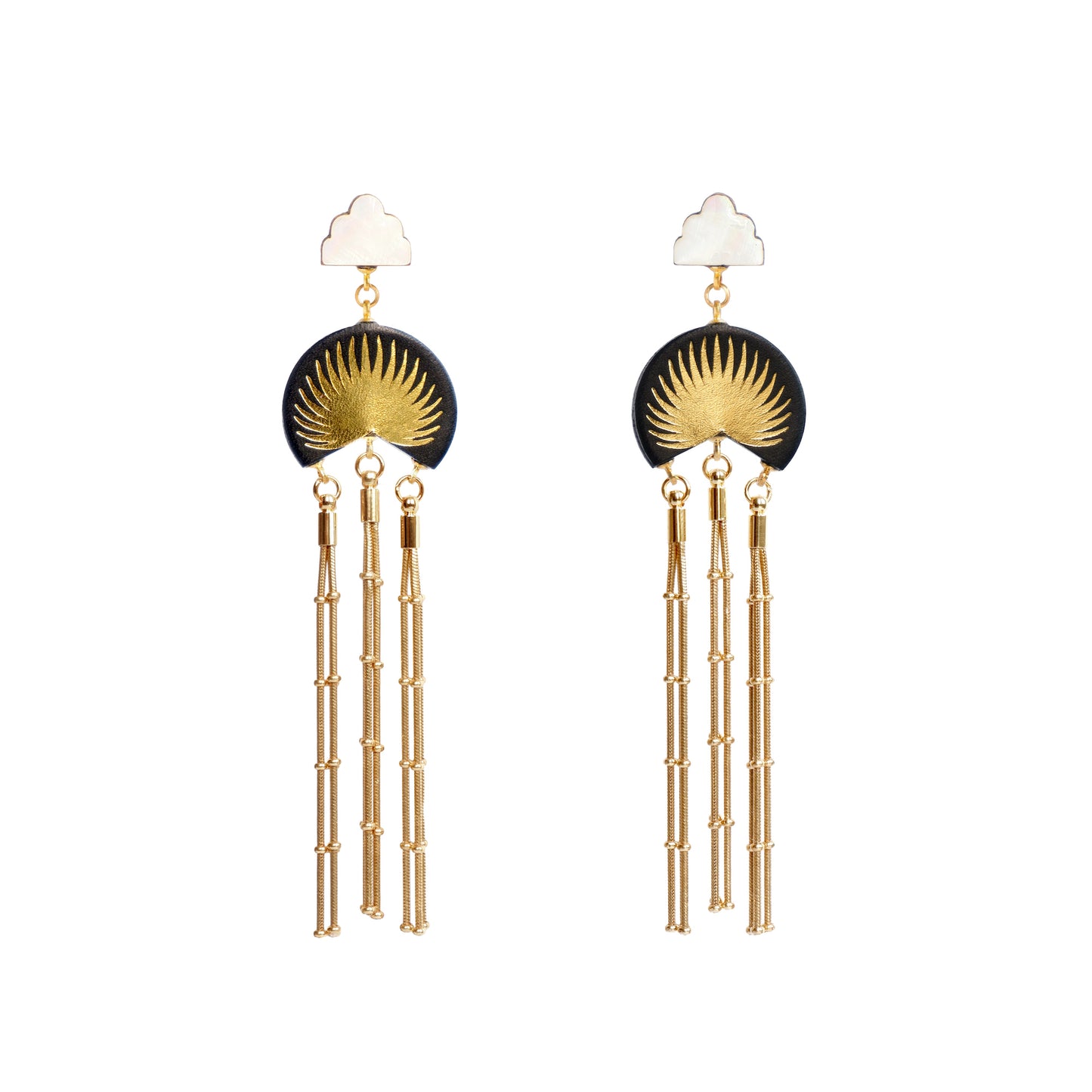 black leather medallion earrings, with gold palm tree print, gold tassels & mother of pearl cloud shade studs.