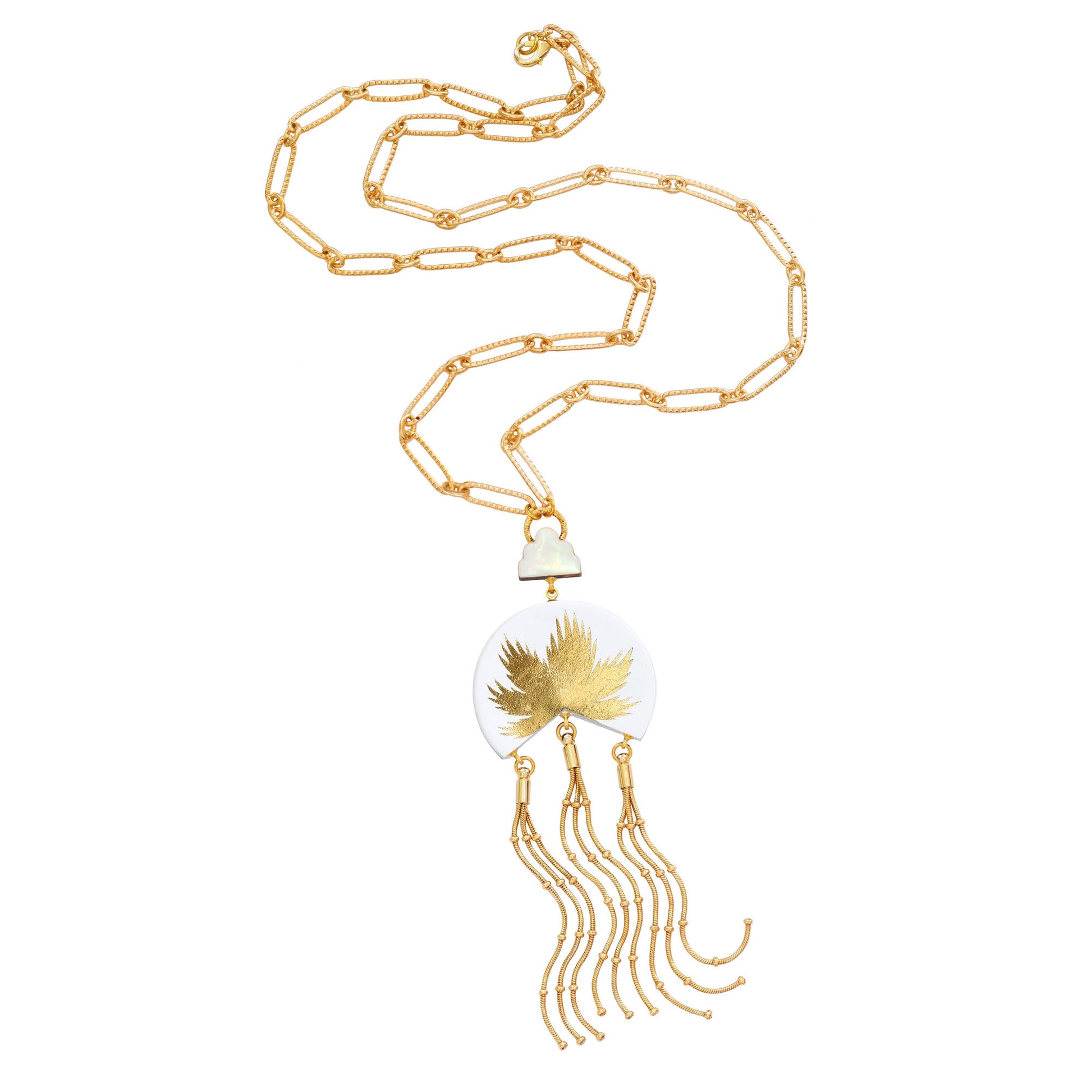 leather medallion pendant, with gold palm tree print,  long gold chain tassels, and mother of pearl cloud, on long-link gold chain