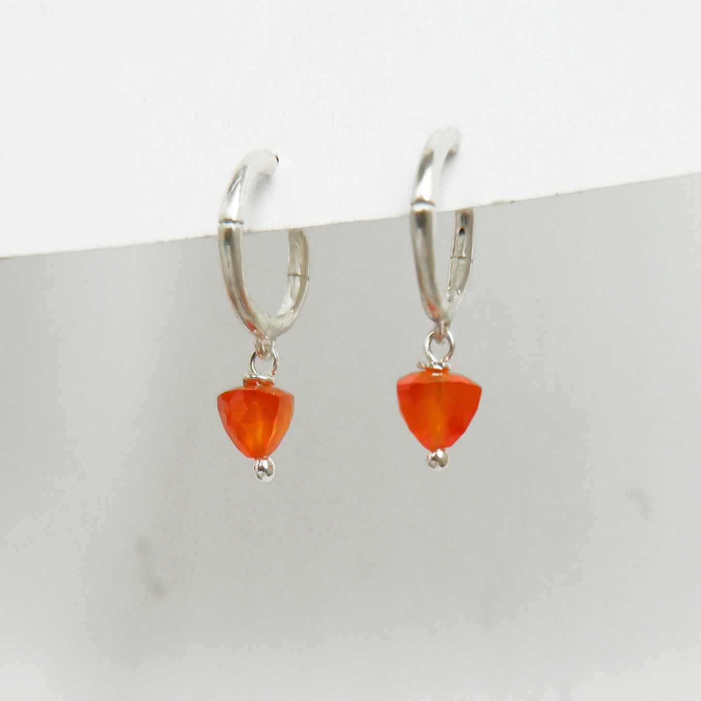 small sterling silver bamboo hoops, with faceted trillion pyramid Carnelian bead charm