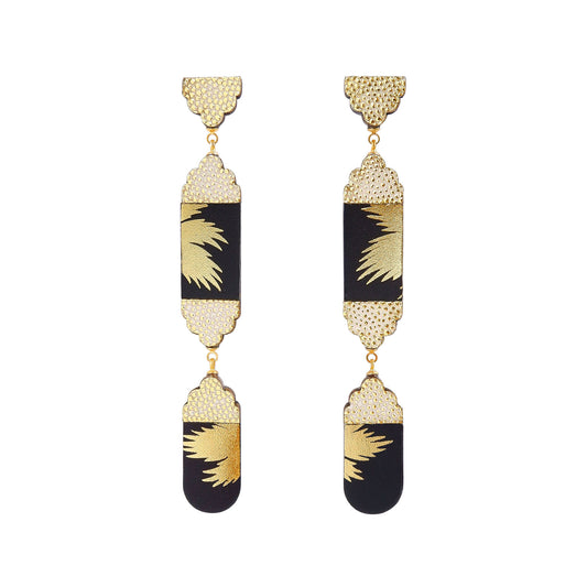 long leather drop earrings with gold palm print & embossed dot pattern