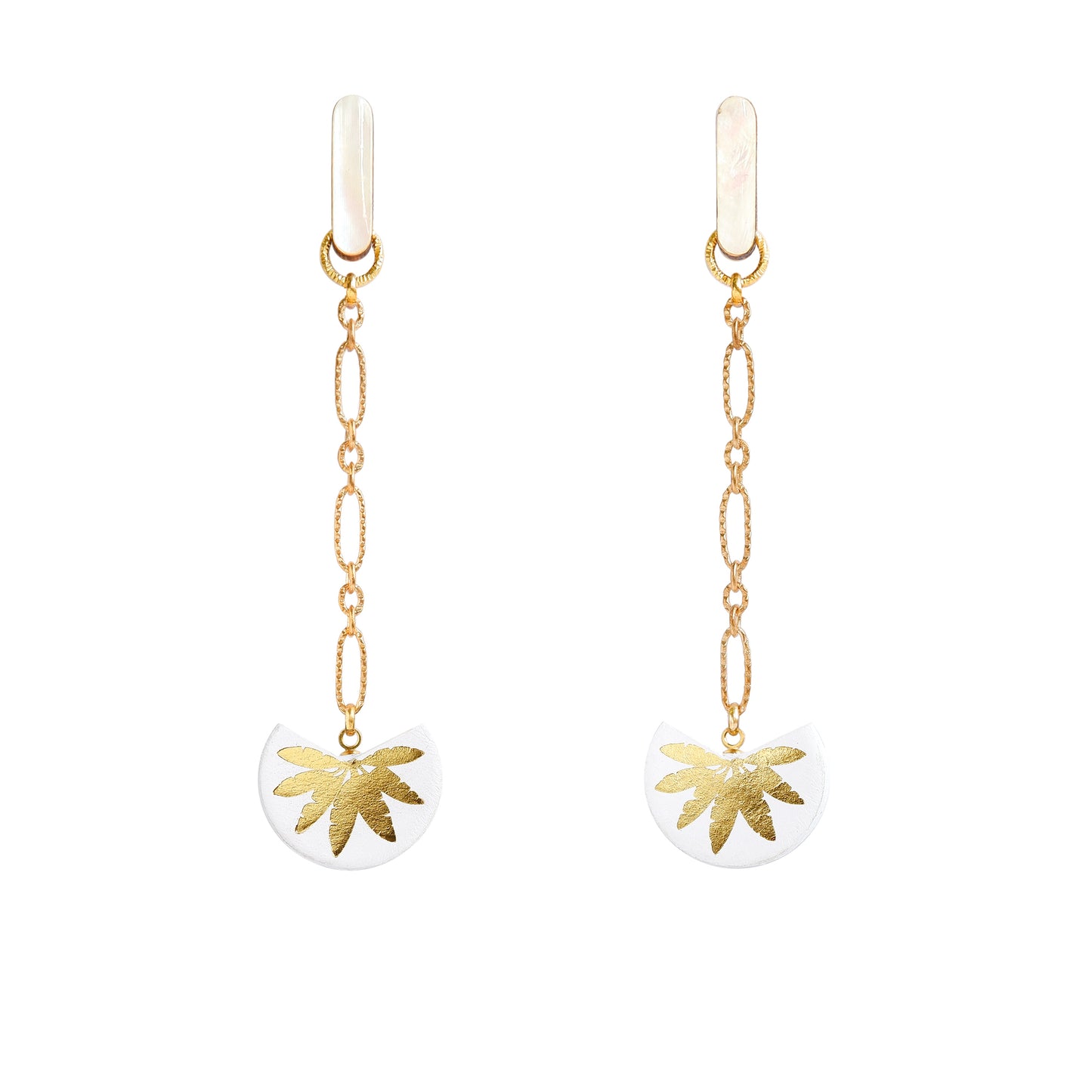 palm tree drop earrings. White leather medallions with gold palm print, on longl-link chain from long mother of pearl studs