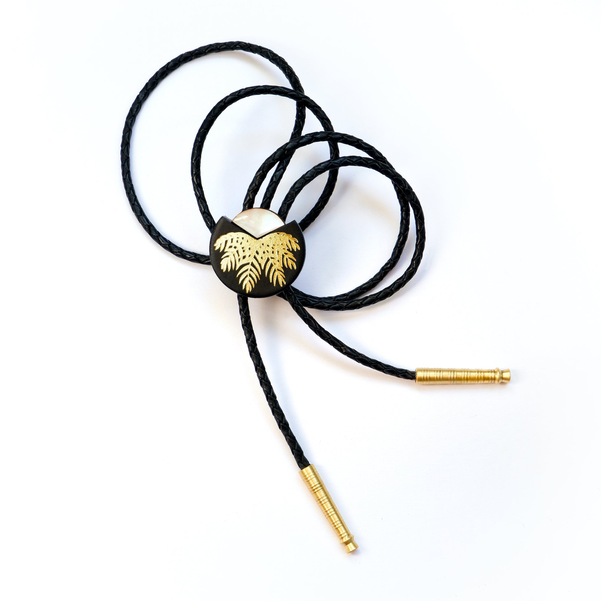Black leather bolo tie with gold palm print, mother of pearl accent & brass tips