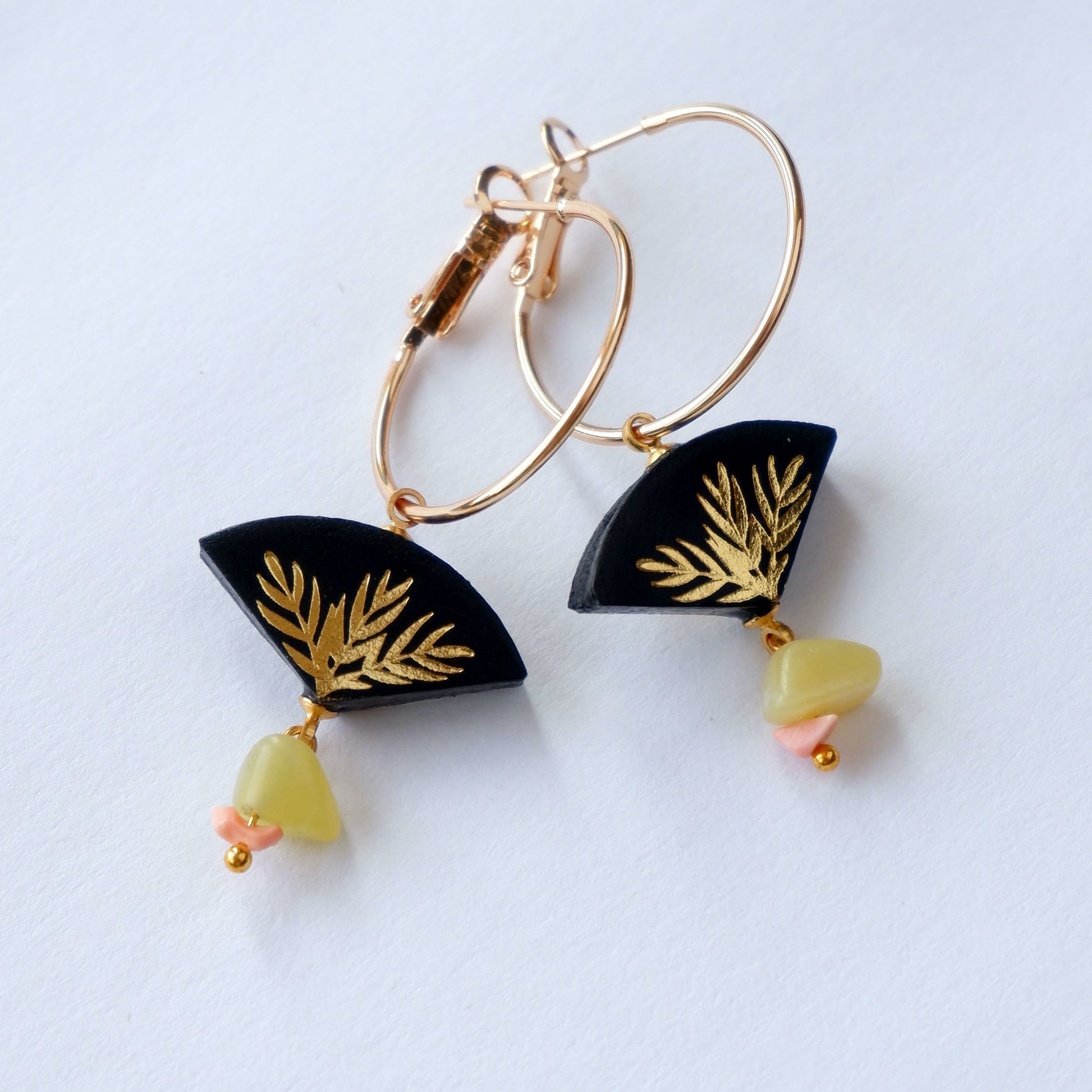 black & gold palm print leather gold  hoop earrings with pink & yellow gemstone bead