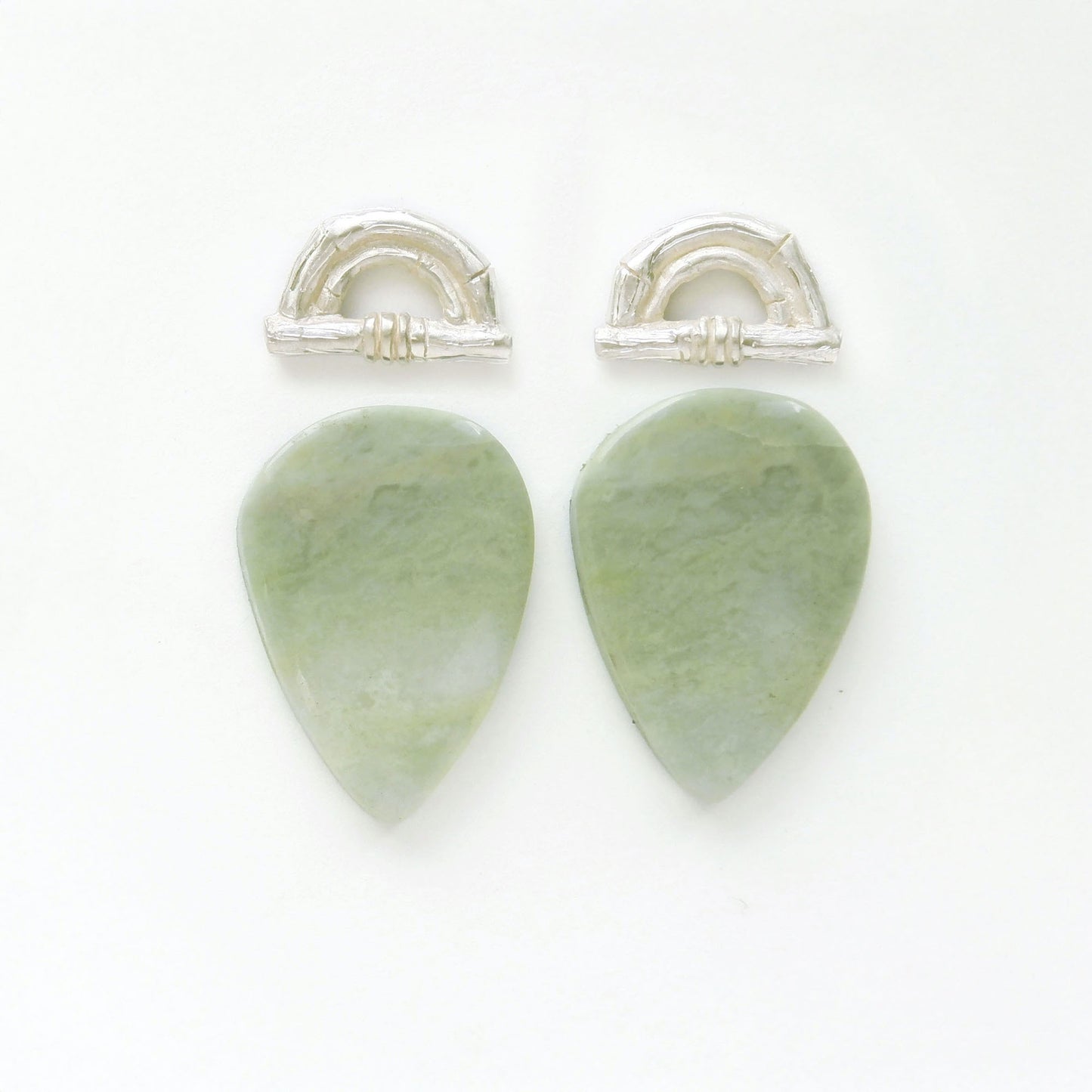 Sterling Silver bamboo sunrise arch design pieces (earring tops) with pointed pear shape light green Serpentine gemstone cabochons 