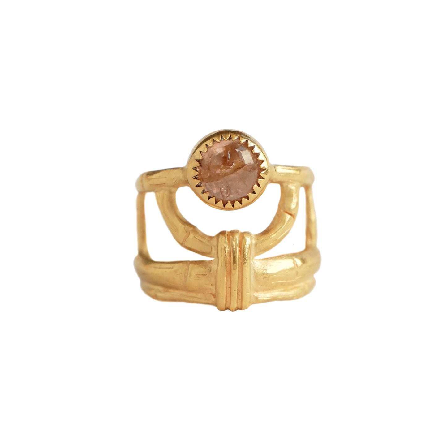 structural open-work ring in a bamboo style, featuring round pale peachy pink Tourmaline cabochon gemstone in a serrated setting. Gold Vermeil.