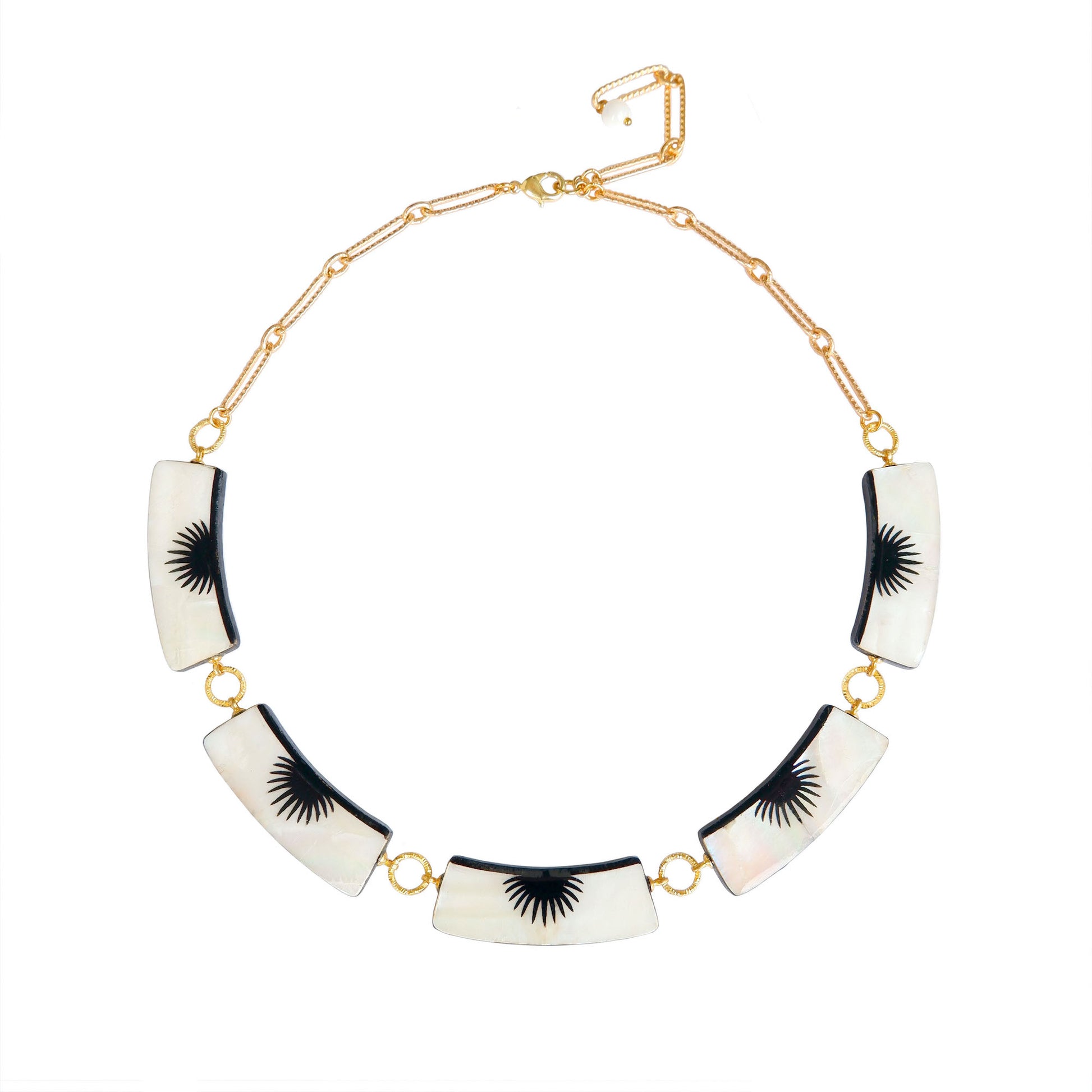 graphic black & white palm design mother of pearl necklace with 5 panels, on golden long-link chain