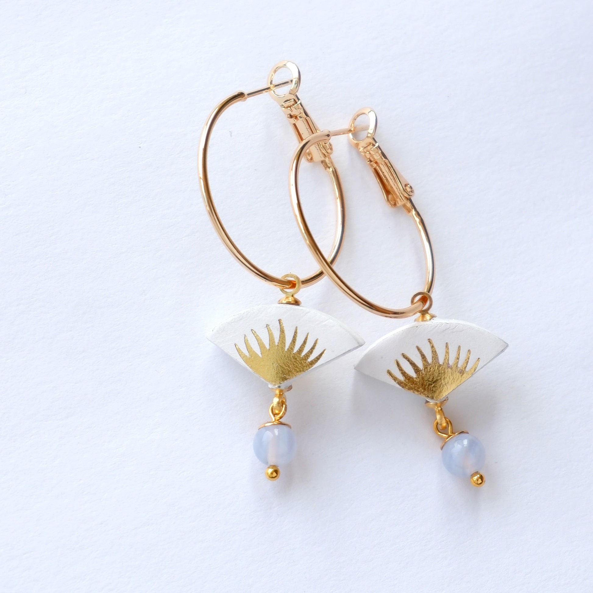 white & gold palm print leather gold  hoop earrings with chalcedony bead