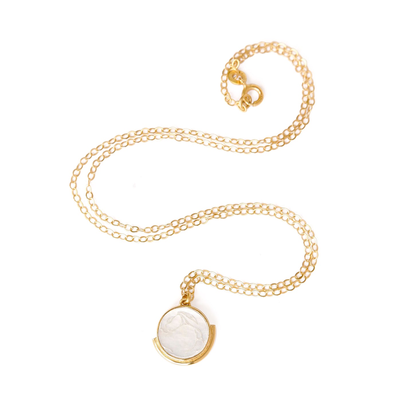 engraved mother of pearl medallion pendant, with white rabbit design, on fine gold vermeil trace chain