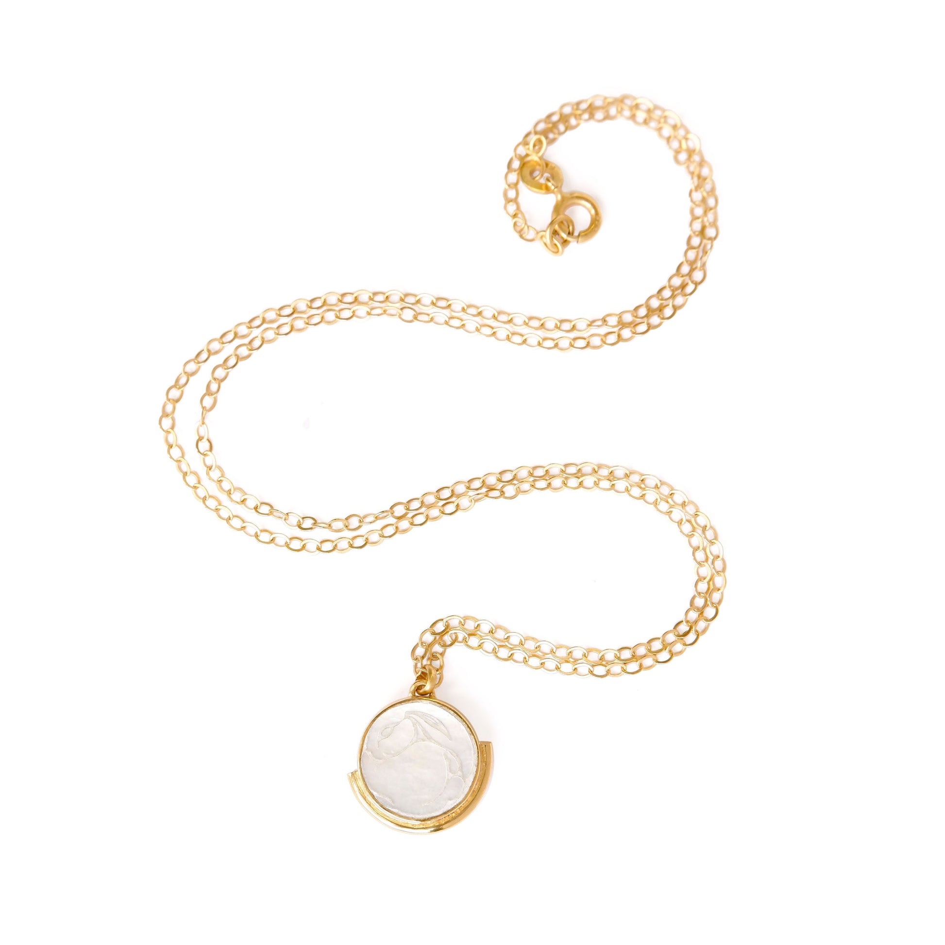 engraved mother of pearl medallion pendant, with white rabbit design, on fine gold vermeil trace chain