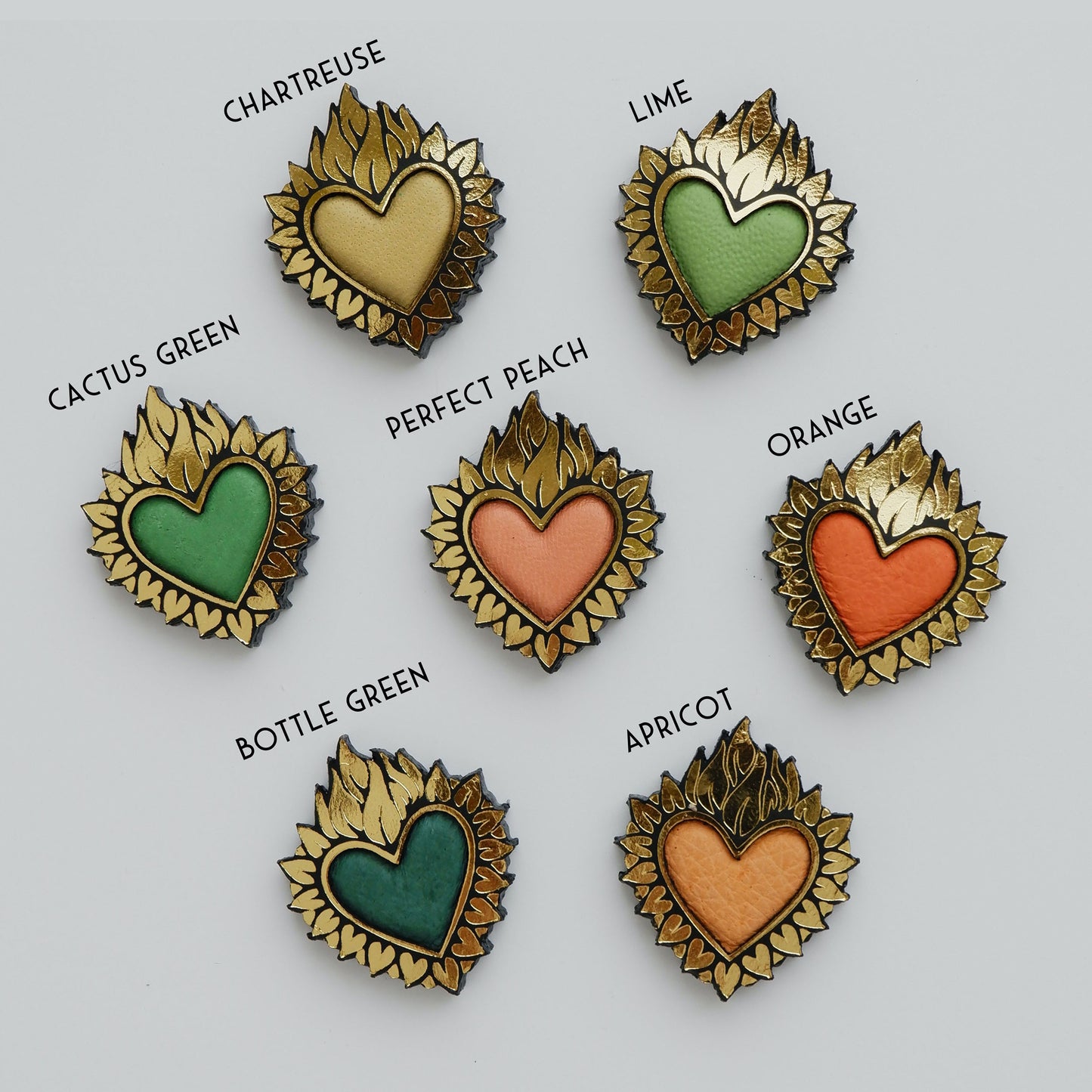 Flaming Heart jewels, in Gold Foiled Leather, with a coloured padded leather centres, in leather & velvet. ( 7 different tropical shades )