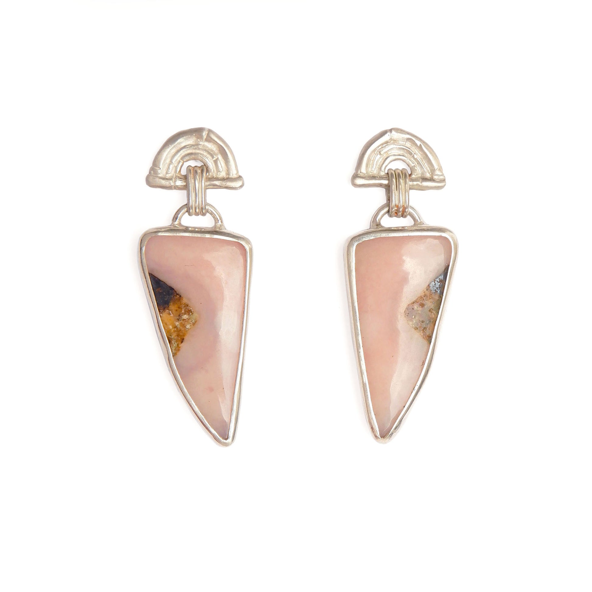 stud earrings in sterling silver, featuring triple arches of bamboo, hung with long pastel pink opal gemstone charm pendants. white background