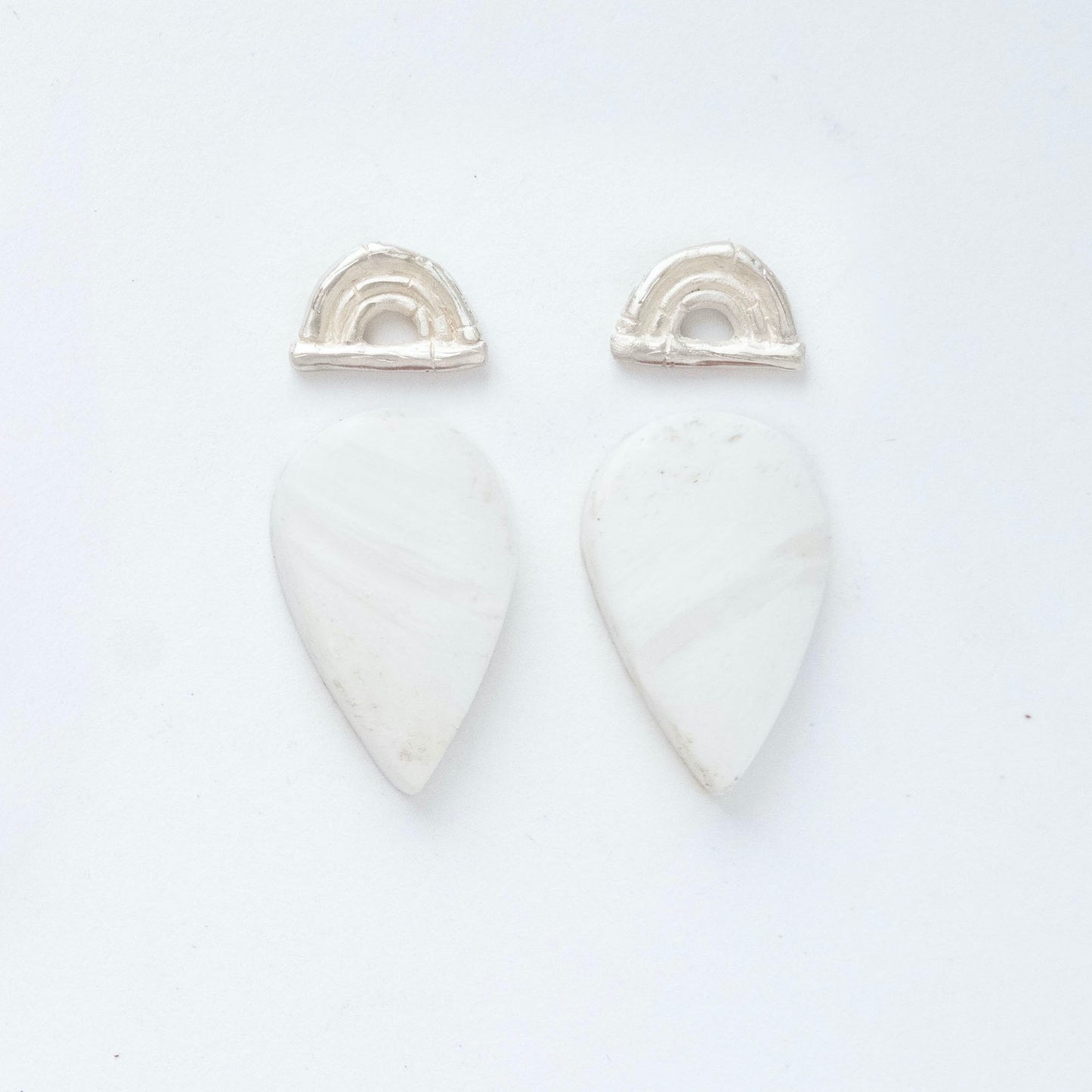 sterling silver triple bamboo arches earring tops, with long pointed pear/teardrop shaped  gemstone cabochons in White Scolecite