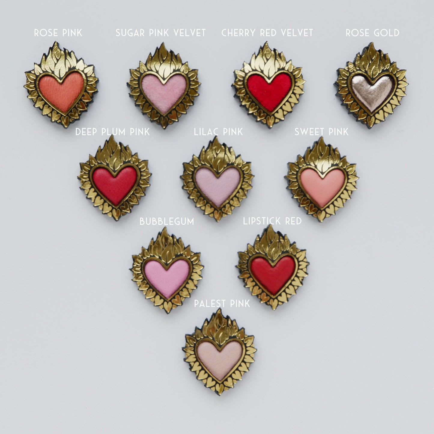 Flaming Heart jewels, in Gold Foiled Leather, with a coloured padded leather centres, in leather & velvet. ( 10 different shades of pink & red)