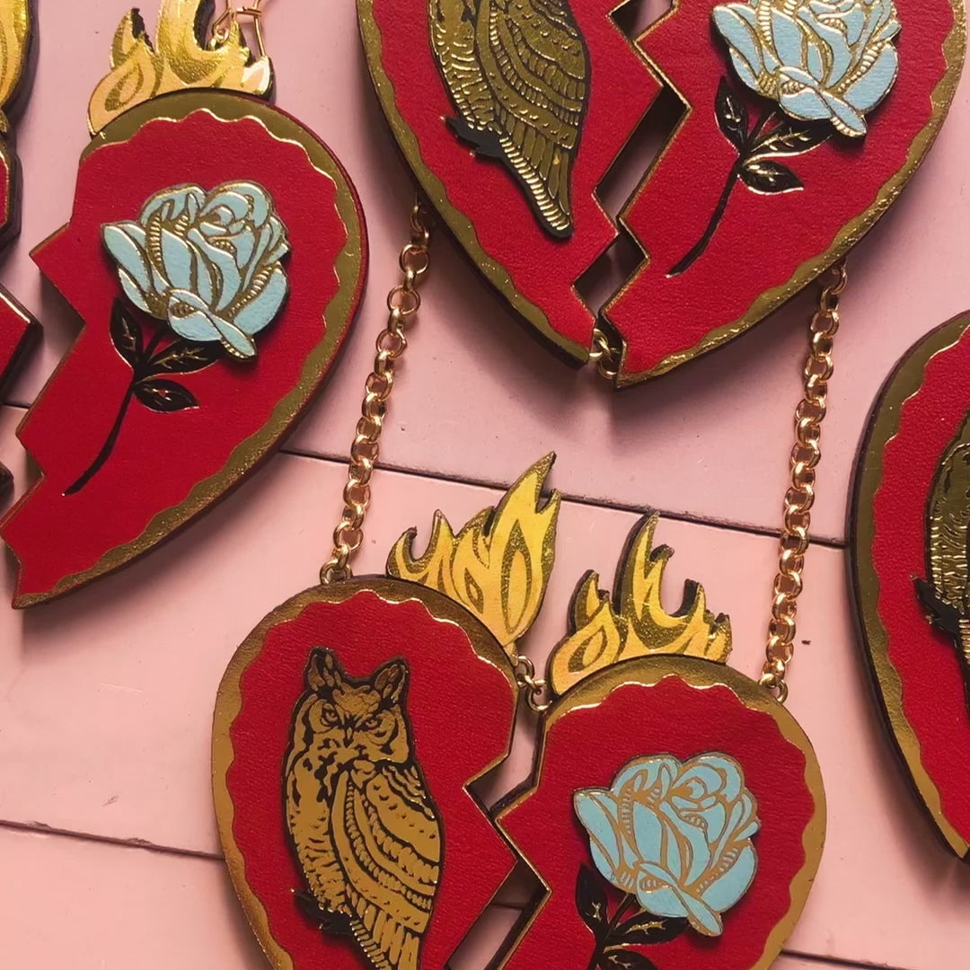 video showing red leather broken heart pendants & earrings.