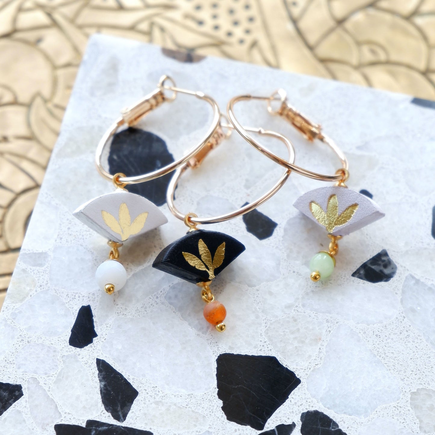 white, black,  lilac & gold palm print leather gold  hoop earrings with coloured glass & gemstone beads