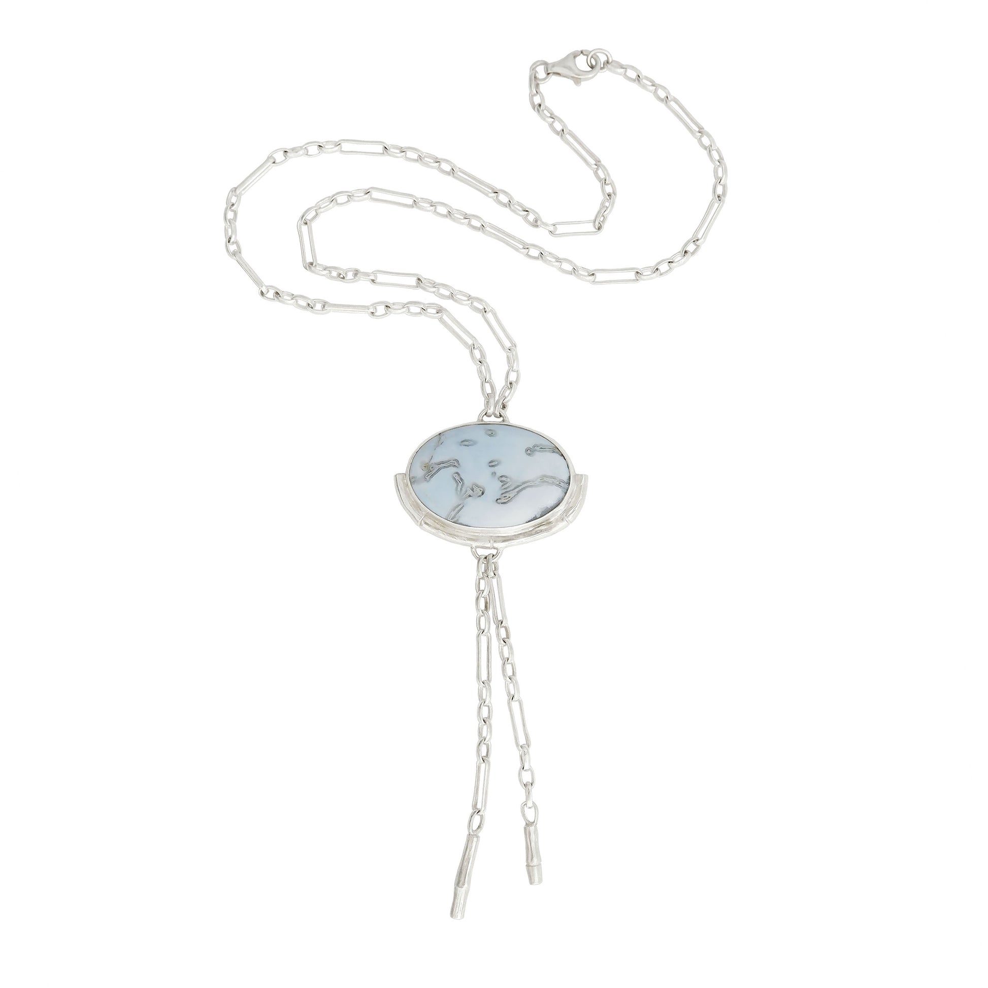 Silver Lariat style chain necklace, with a large marbled pale sky blue peruvian opal pendant, framed  by a half halo of silver bamboo. 