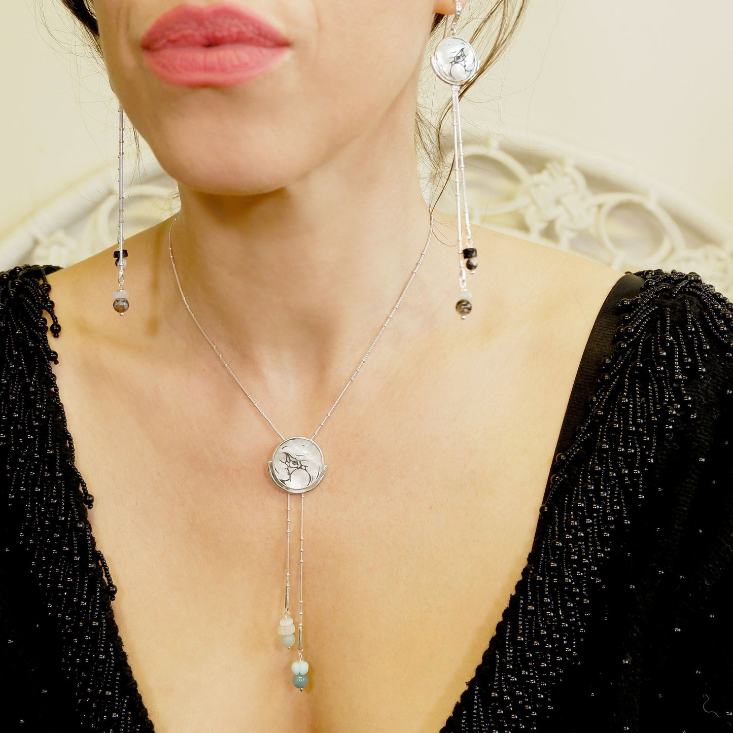 Volta mother of pearl full moon bolo lariat neklace & matching tassel earrings in sterling silver, on model