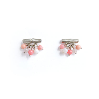 Sterling Silver bamboo bar stud earrings with gemstone beads in coral pink, white background