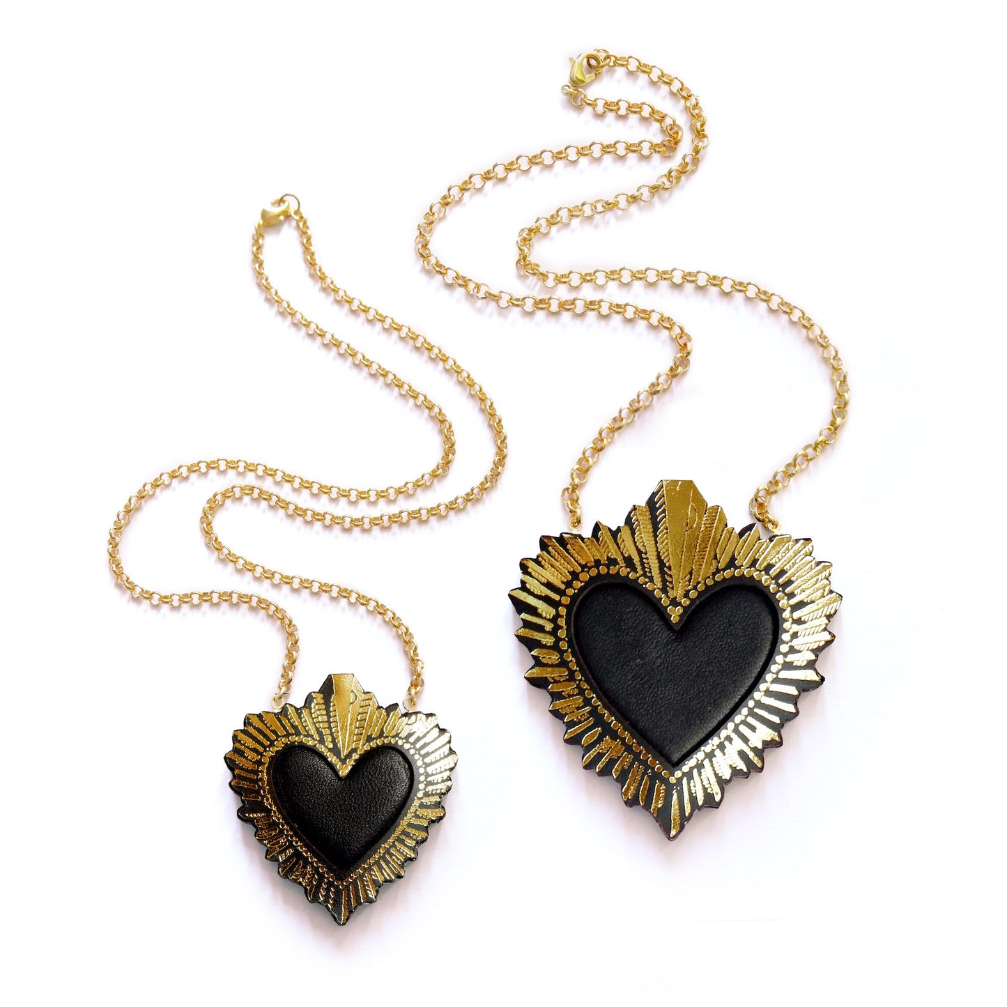 two sizes of black leather sacred heart pendant necklace, on gold belcher chain