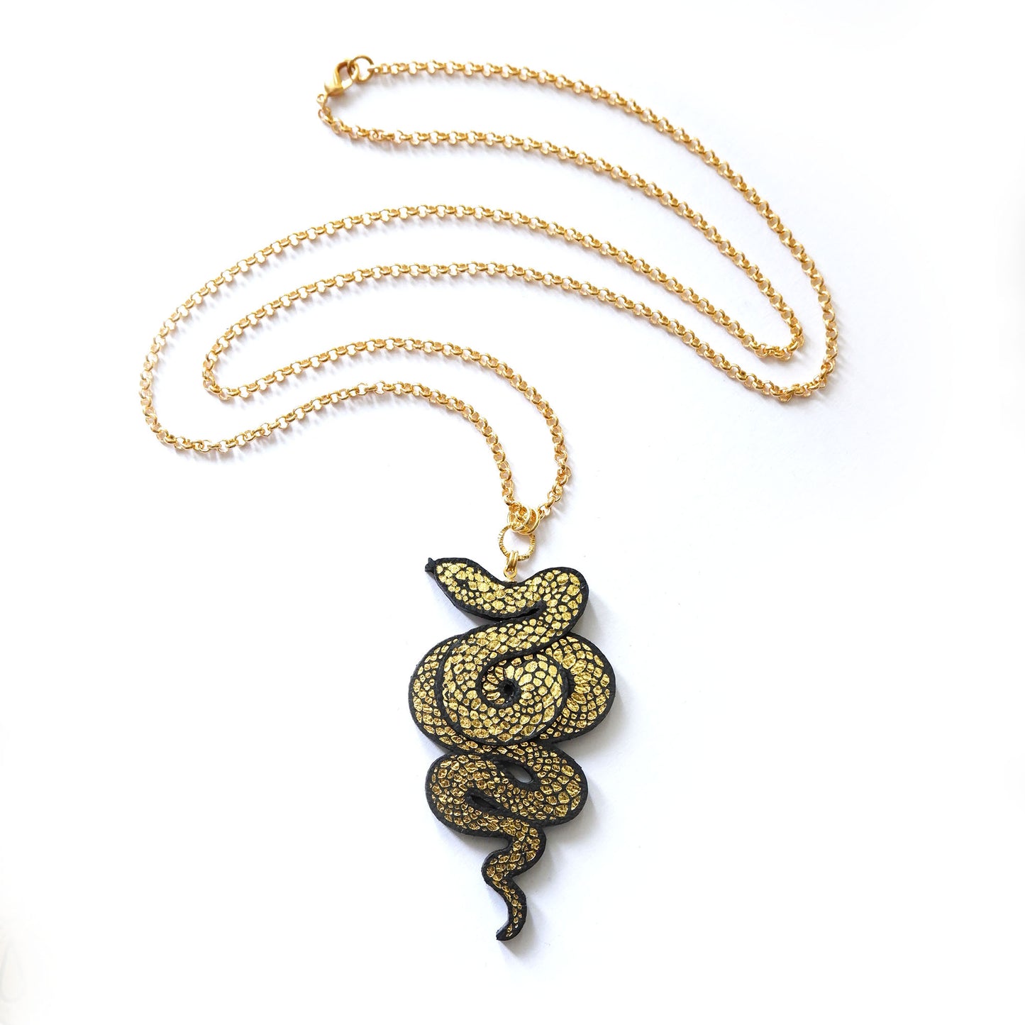 vegan black & gold serpent pendant on gold belcher chain