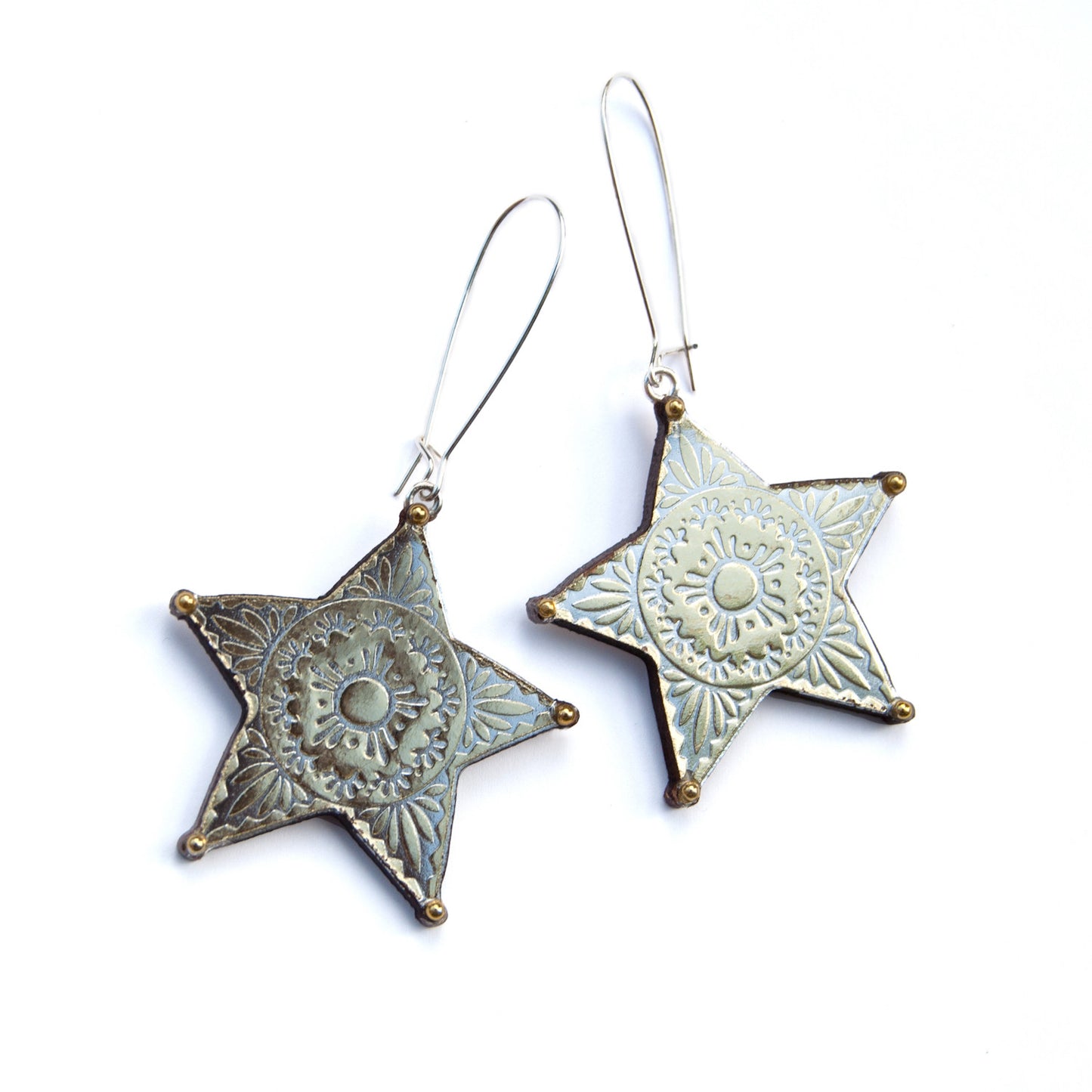 CONCHO STAR . earrings