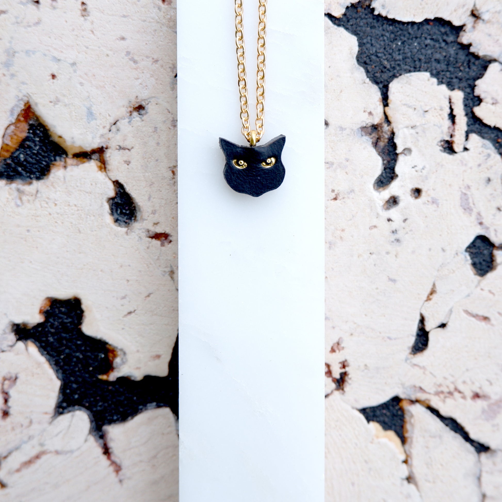 Little Black Cat Head Pendant with gold eyes on fine gold chain