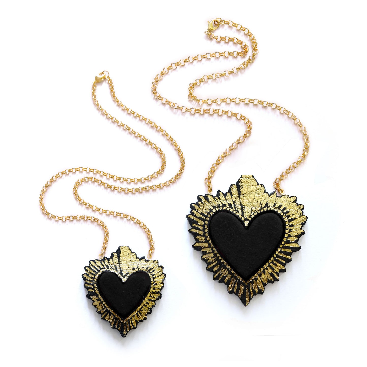 two sizes of black velvet sacred heart pendant necklace, on gold belcher chain