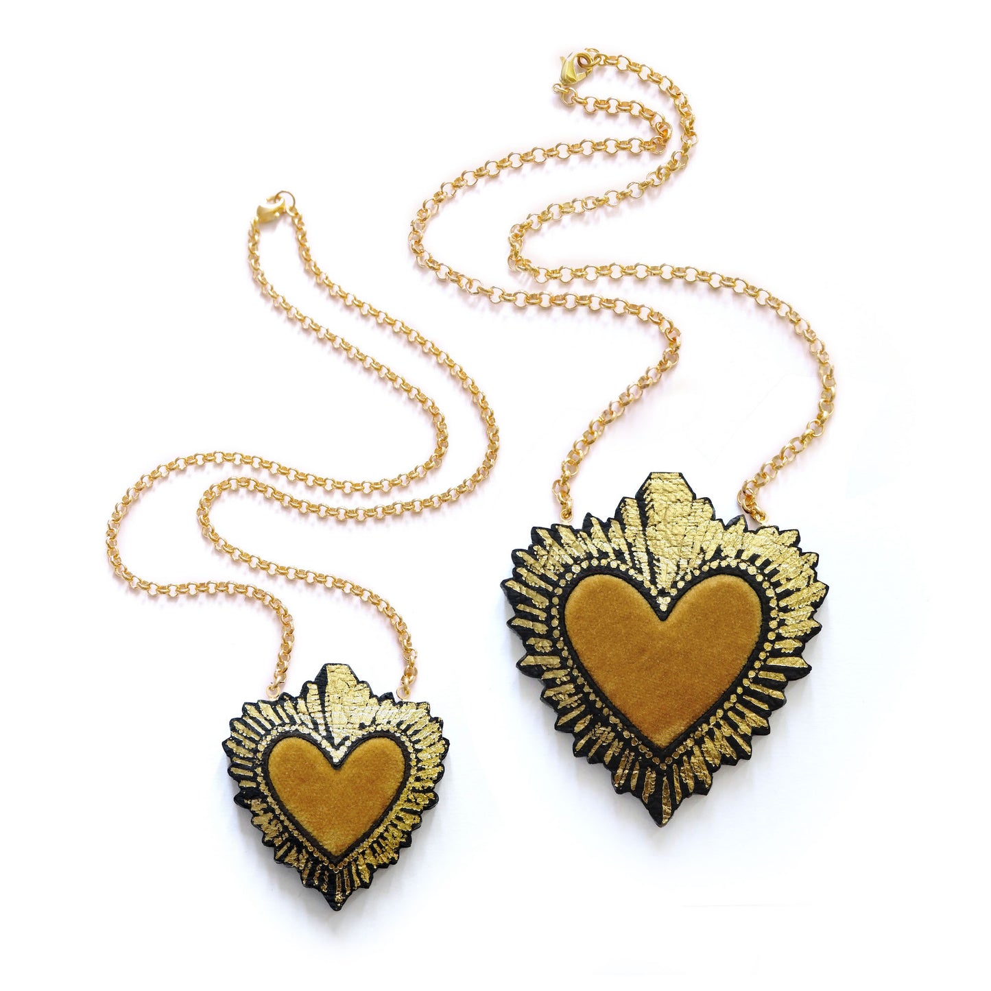 two sizes of ochre velvet sacred heart pendant necklace, on gold belcher chain