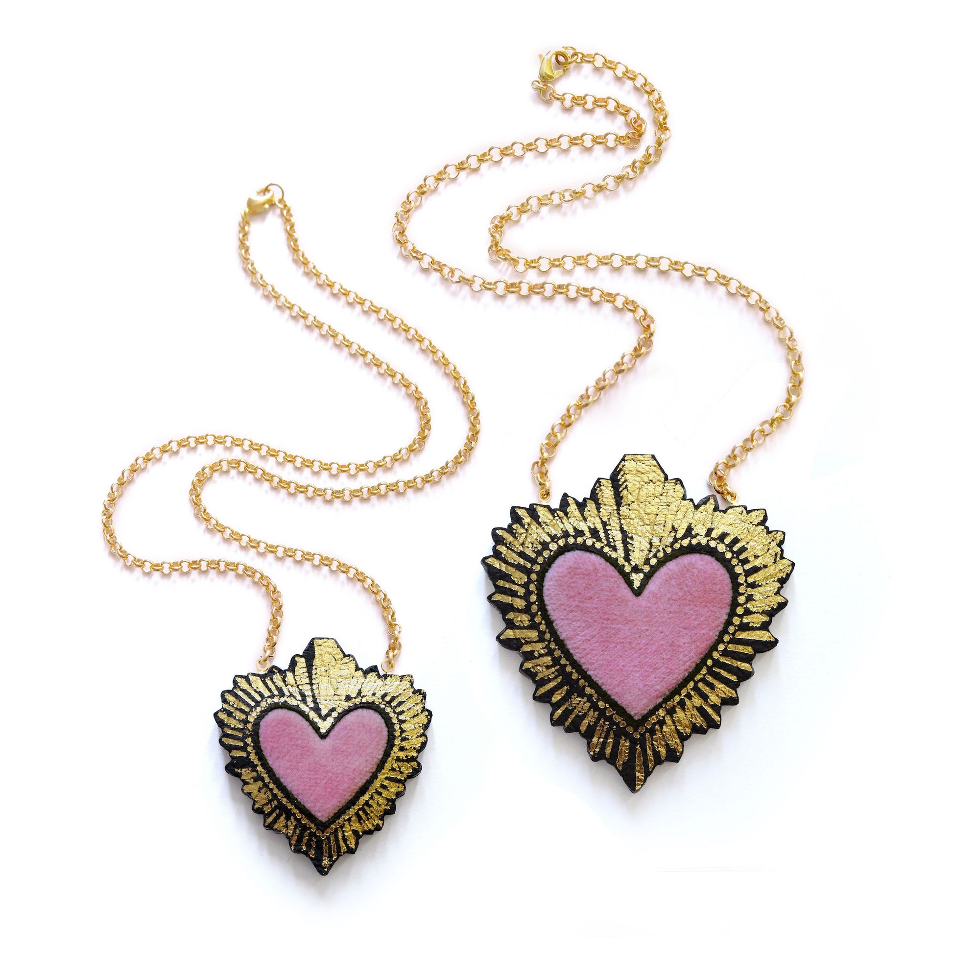 two sizes of pink velvet sacred heart pendant necklace, on gold belcher chain
